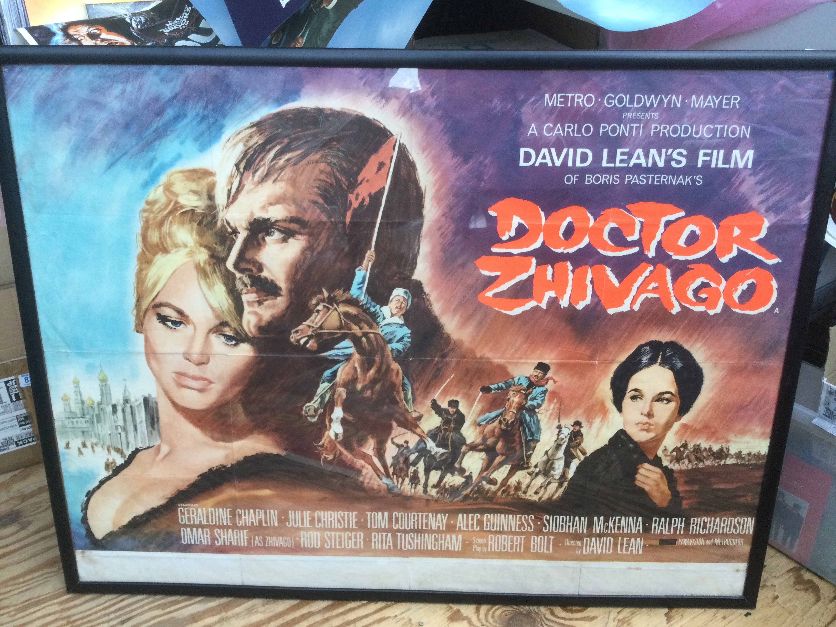 A framed UK quad film poster for Doctor Zhivago. Has been folded with some losses, see images.