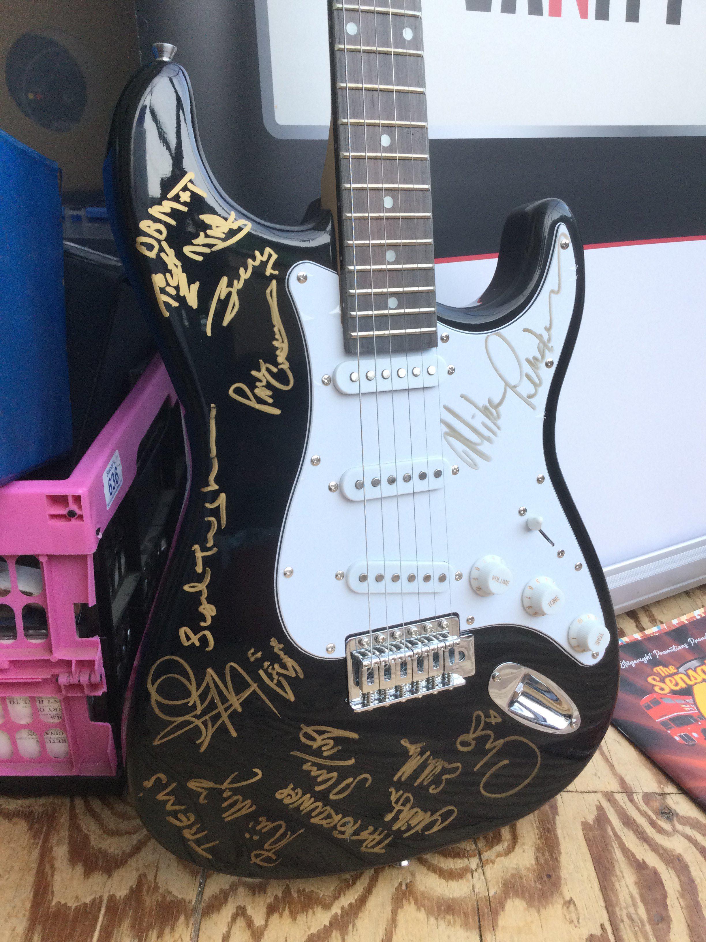 A multi signed guitar, roller banner and program for The Sensational 60s Experience tour in 2022/23. Names include Mike Pender, Mike D'Abo and others.