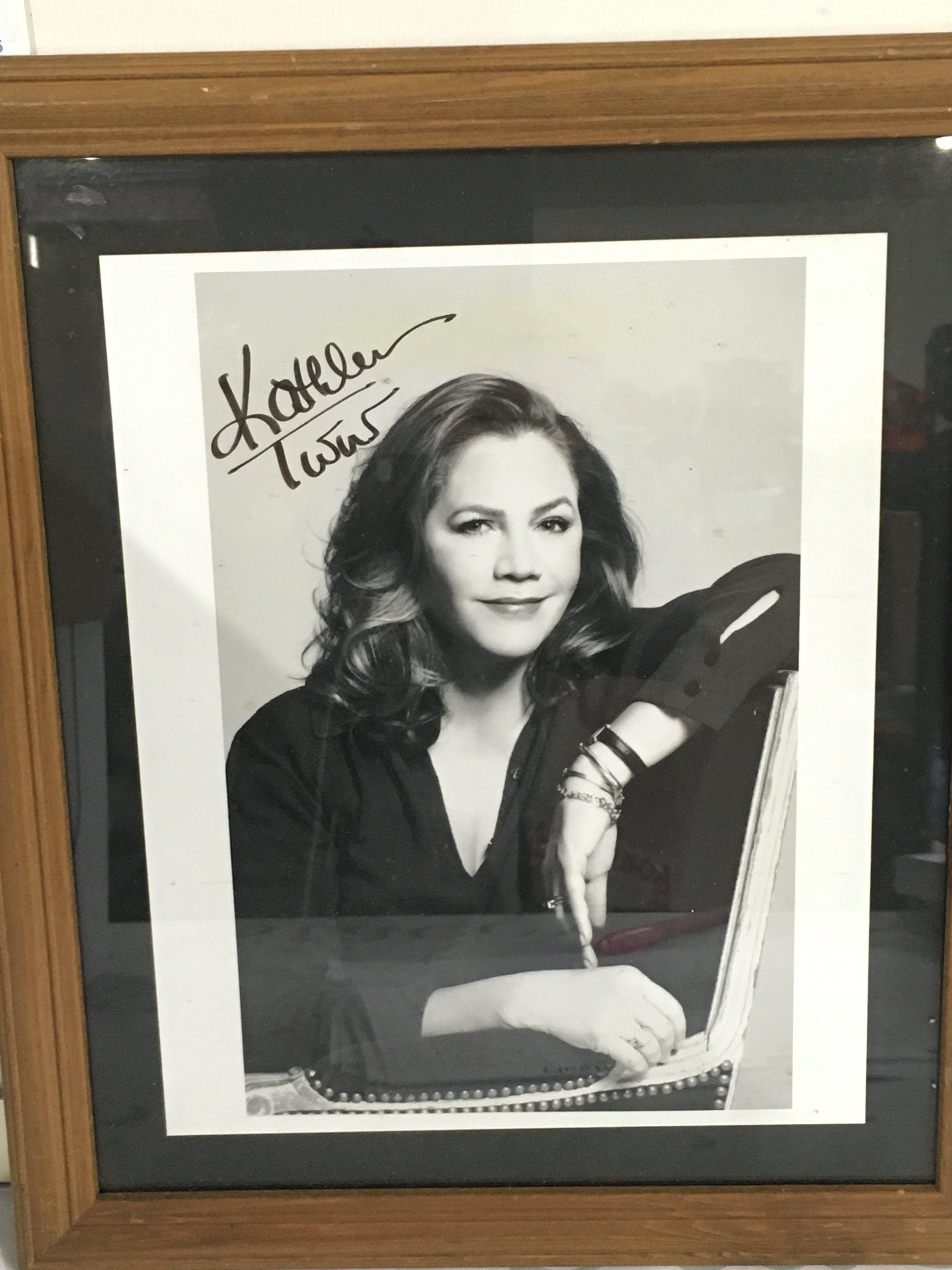 Three framed and signed photos of actors comprising Michael Caine, Kathleen Turner and Tony Bennett. No COAs. Please note that buyers must satisfy themselves as to the authenticity of any signed items before bidding as we are not experts in this field and will not be held responsible should they prove to be anything other than genuine.