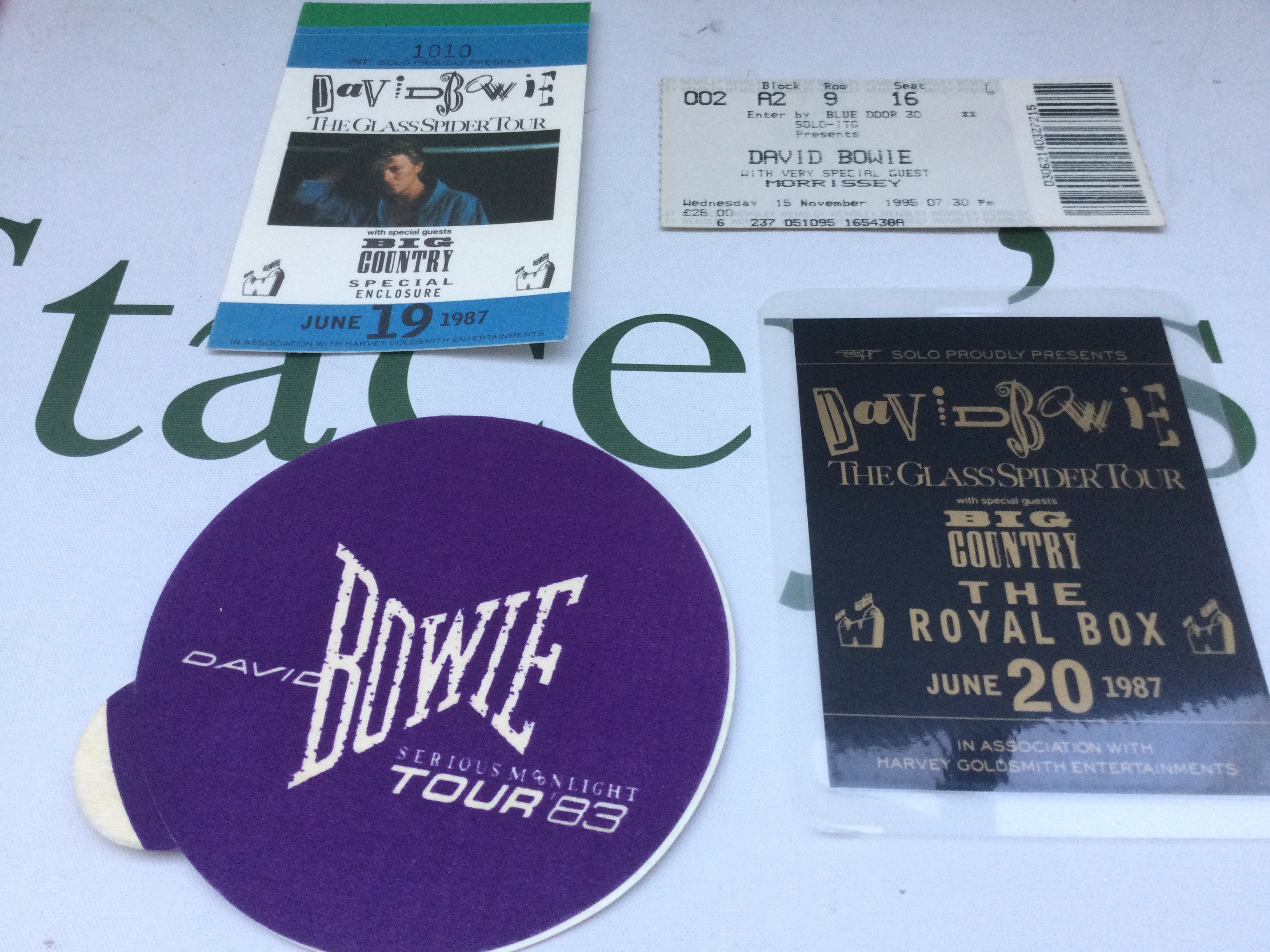 A collection of David Bowie tour ephemera comprising two tickets for performances at The Empire Pool, Wembley 1976 and original tour programme plus two other tour programmes from 1973 and 1974 plus a 1976 Wembley concert badge and other items.