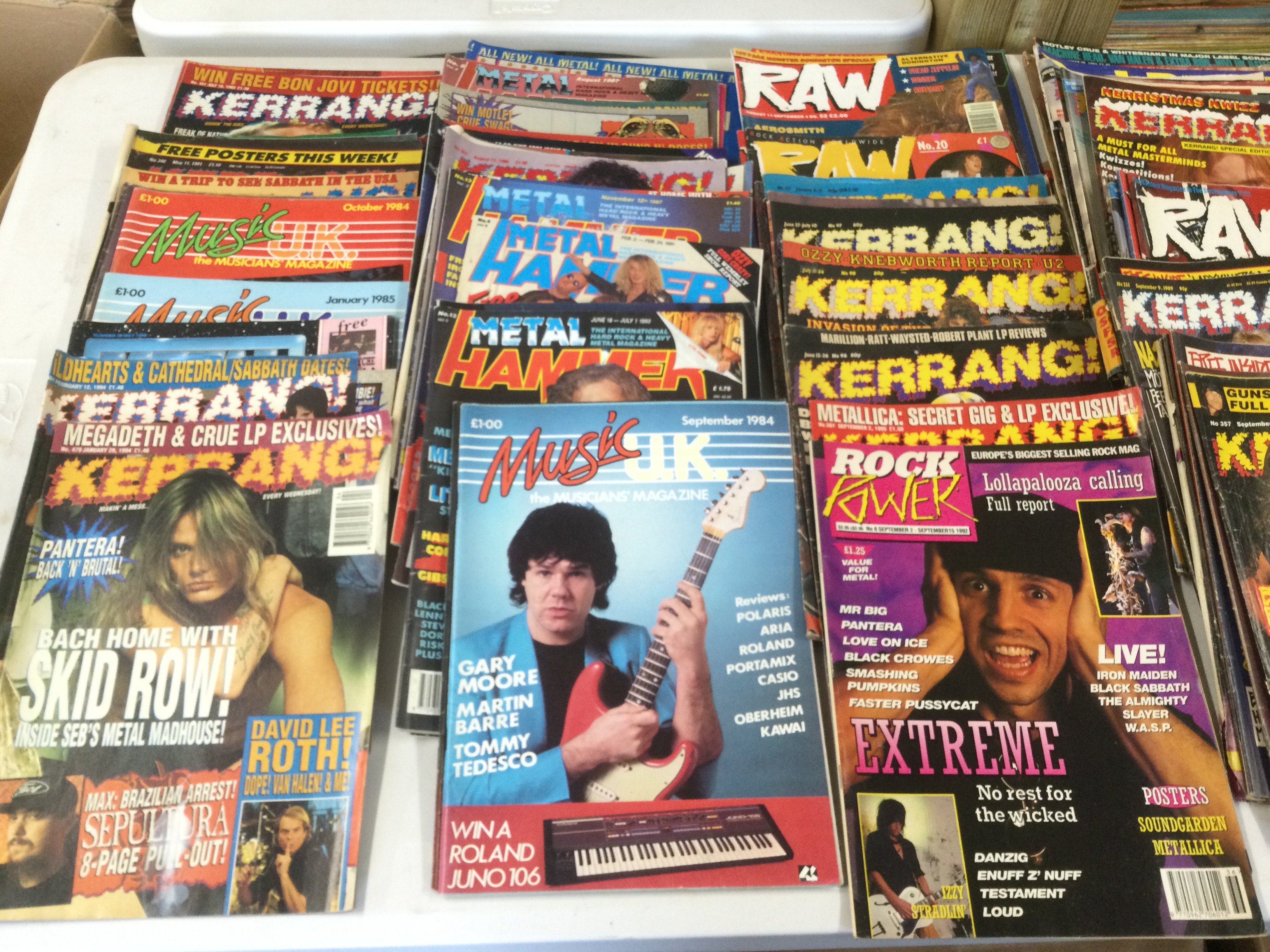 Two boxes of music magazines comprising various issues of Kerrang!, Raw, Metal Hammer, Music UK