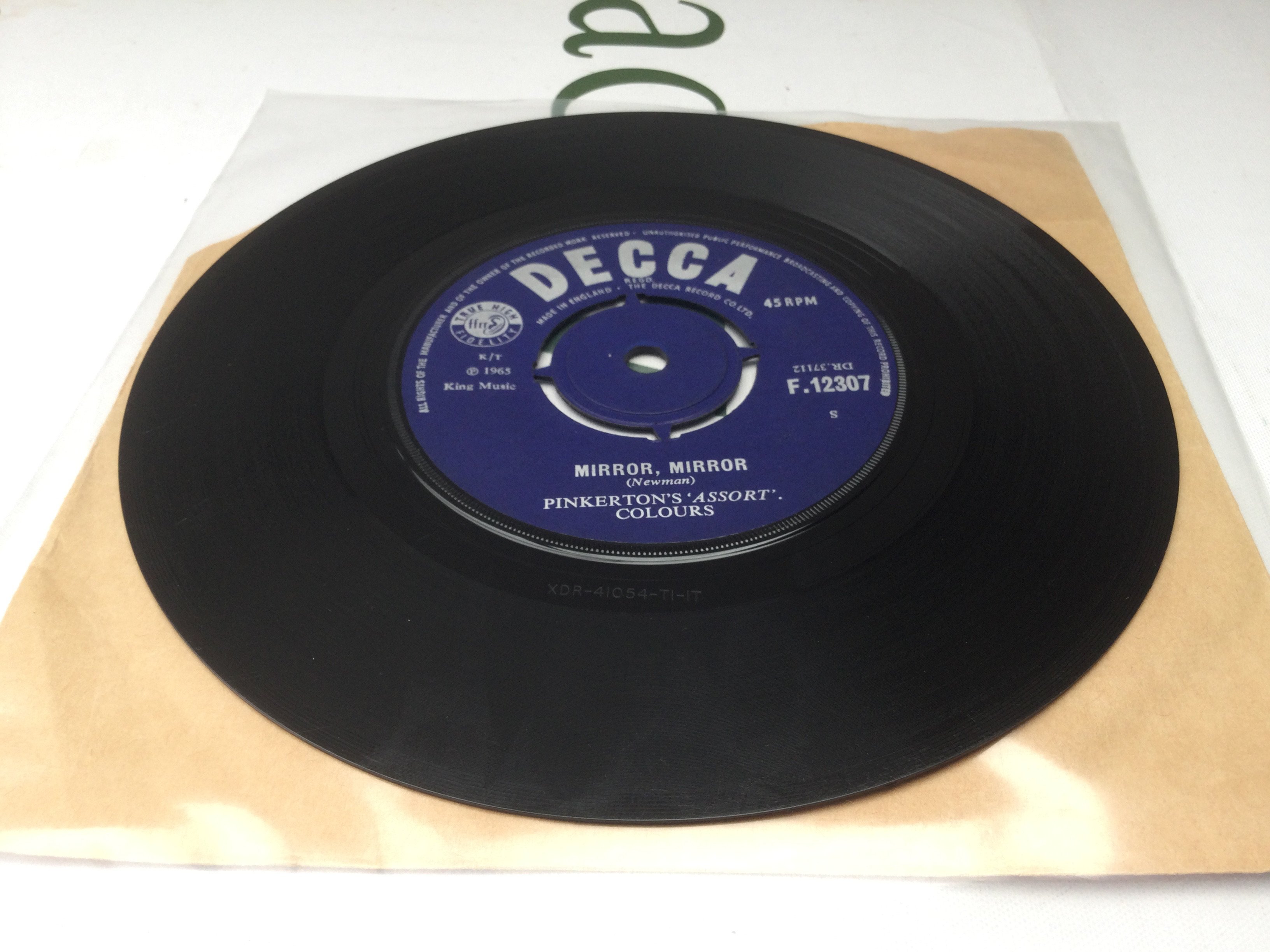 A rare 7" mispressing of Jimi Hendrix & Curtis Knight's How Would You Feel with labels for Mirror Mirror by Pinkerton's Assorted Colours on both sides.