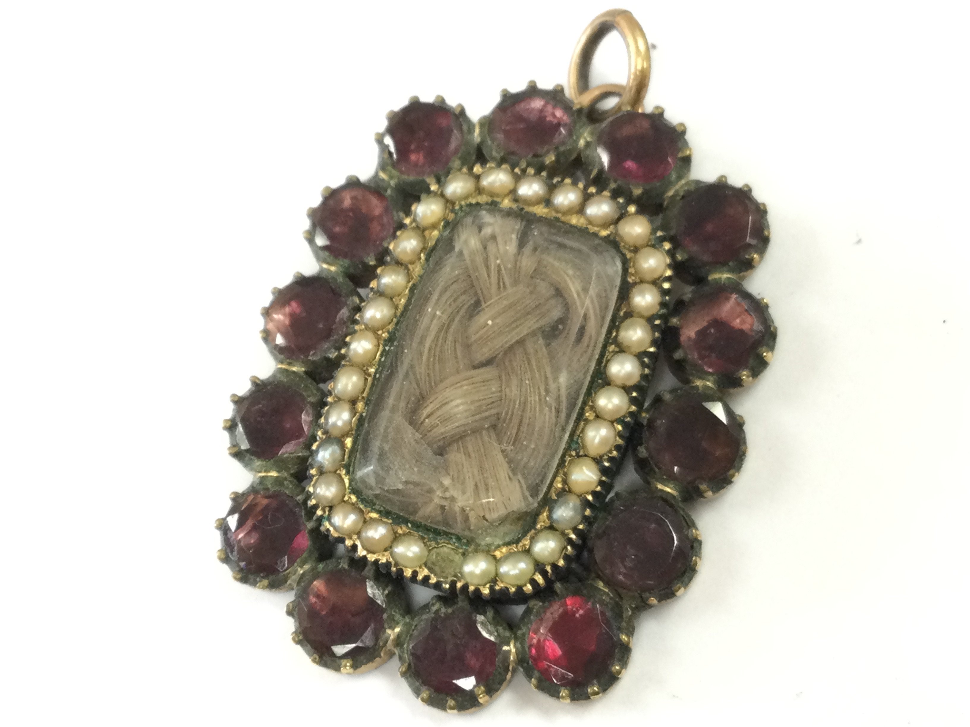 A mourning brooch , postage category A