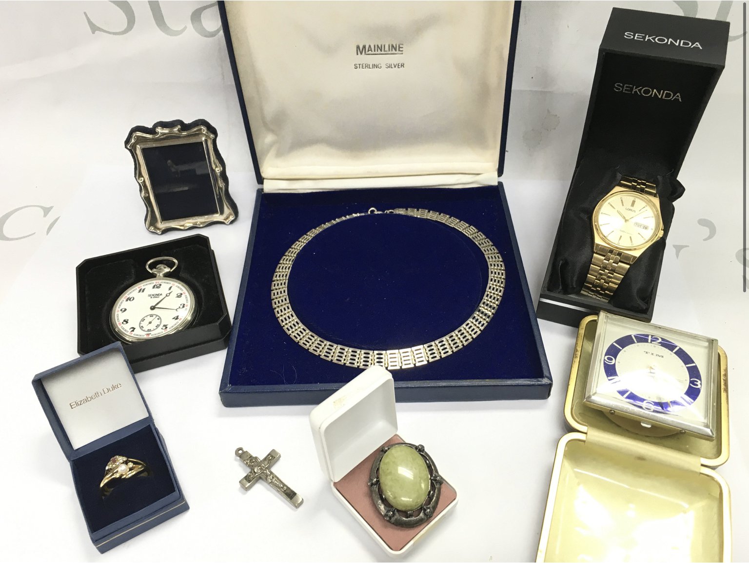 A collection of jewellery including a boxed silver gate link necklace, watches, silver frame etc . Postage category B