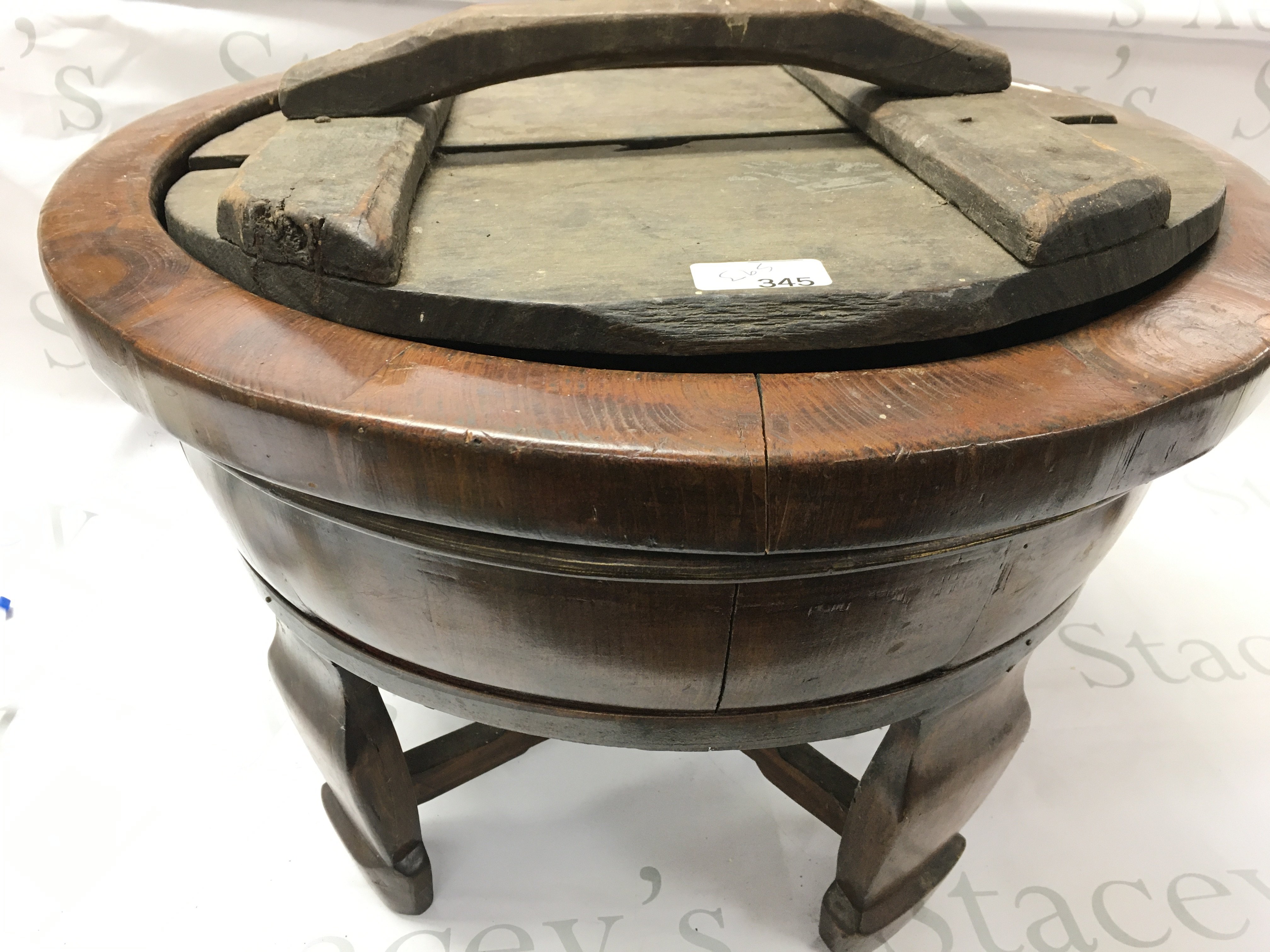 A Wooden Planter With Lid.approximate size 50CM Across x 35CM in Height. No Reserve.