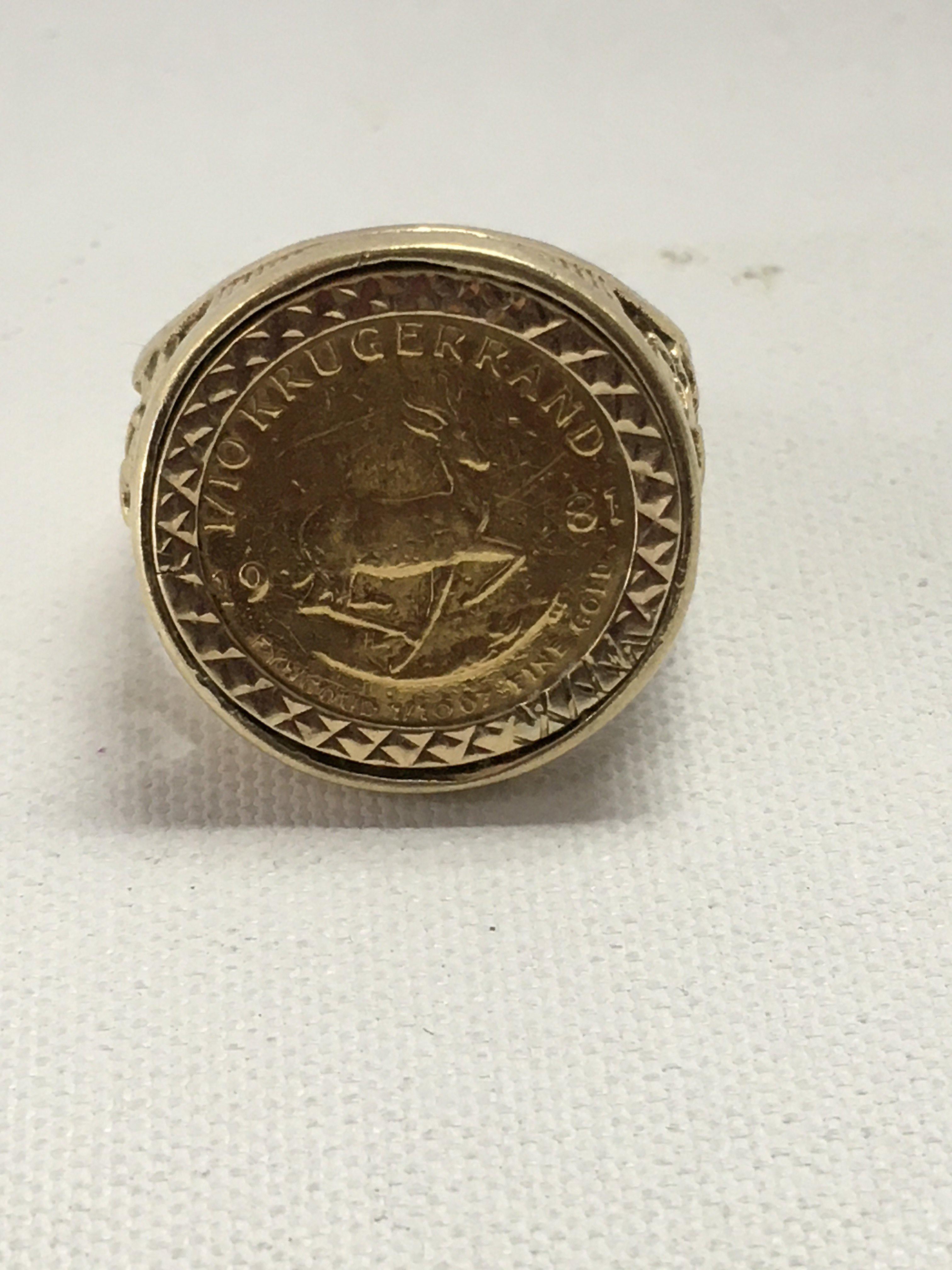 A 1/ 100 gold Krugerrand coin mounted in to a 9 ct ring .