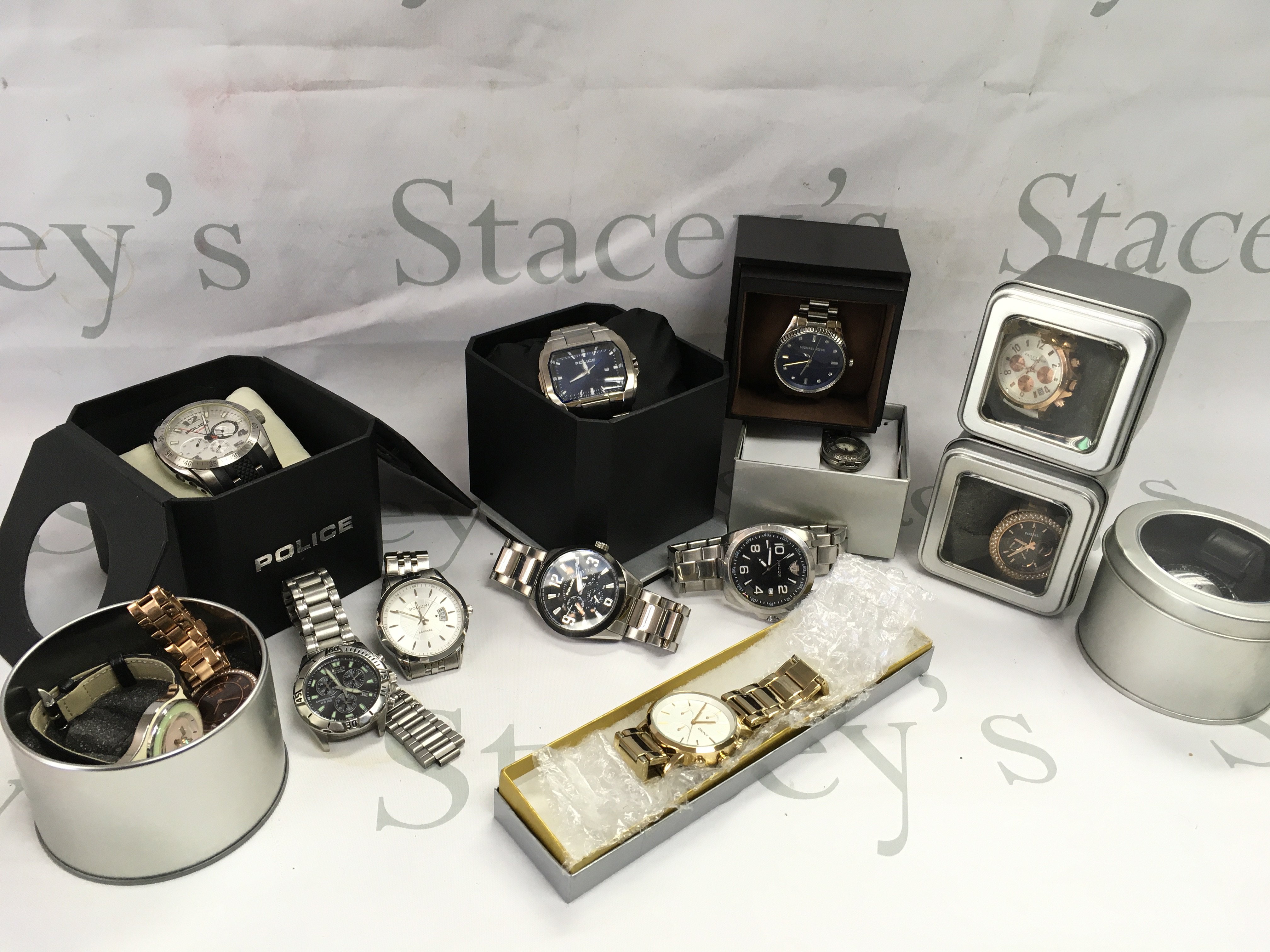 A collection of watches including Police, DKNY, Micheal Kors, Citizen etc , some boxed.