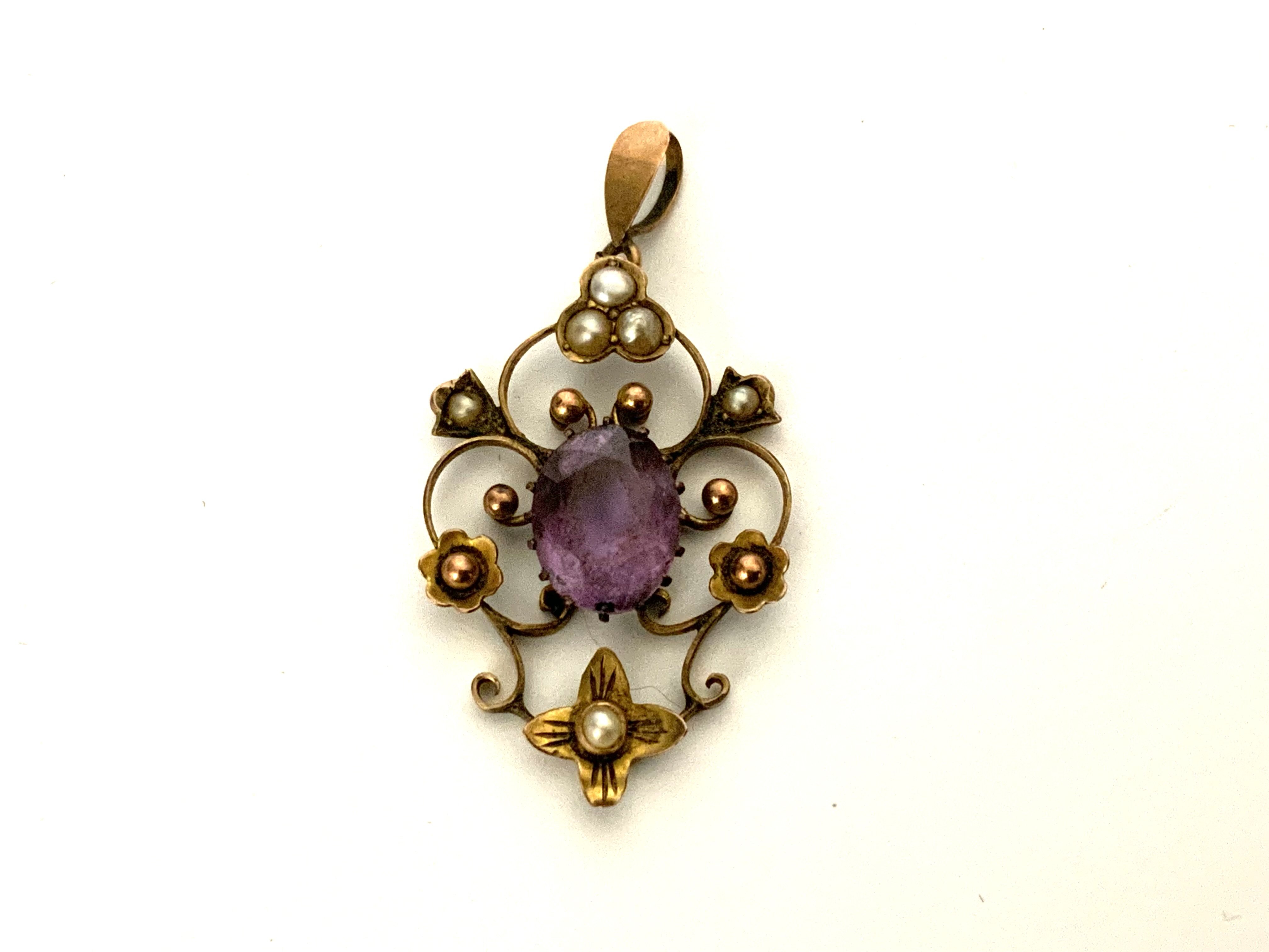 A 9ct gold amethyst and seed pearl pendant