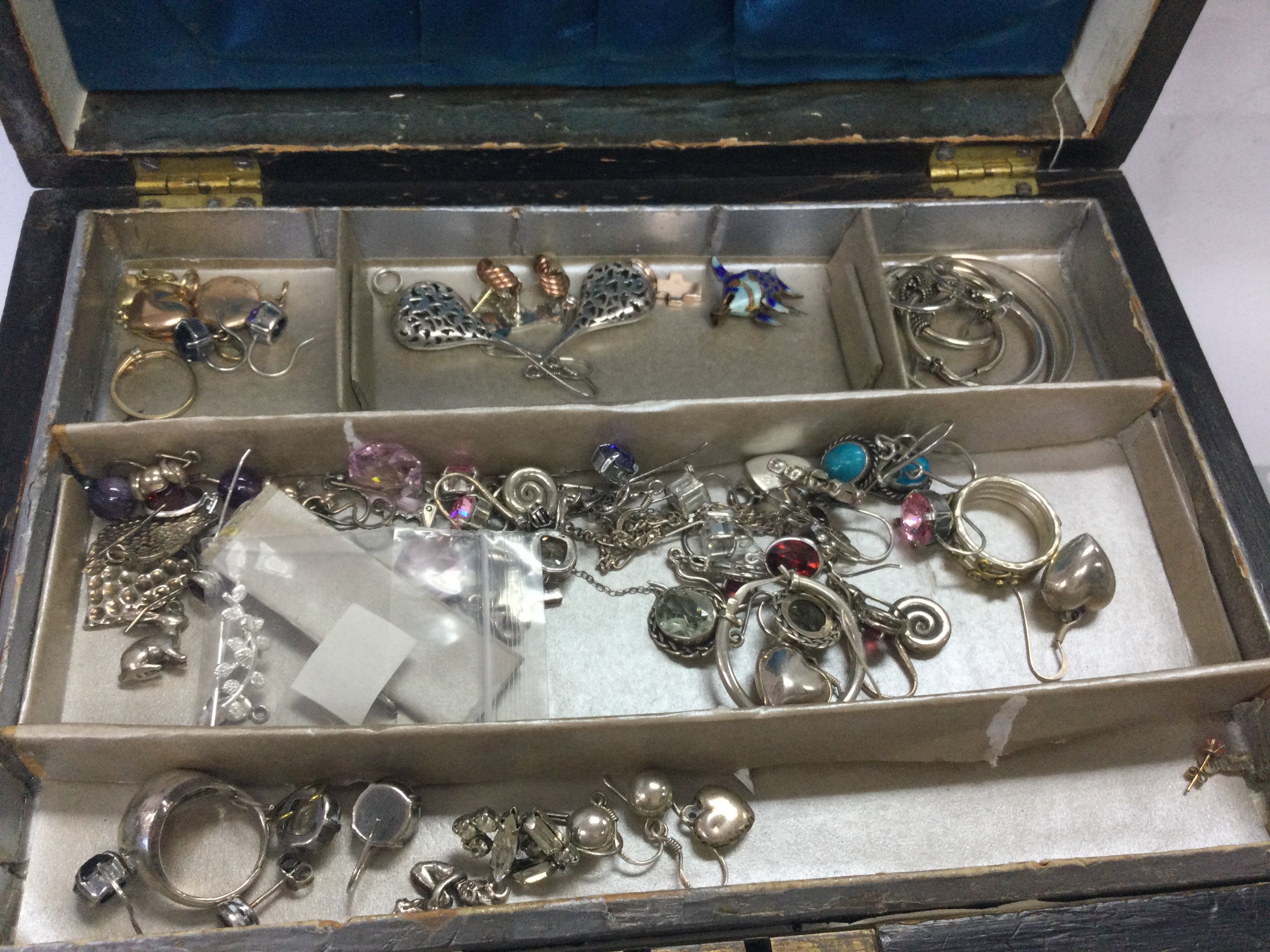 A box of mixed costume jewellery including brooches, necklaces , silver rings , silver earrings , 9ct gold pendants , gold earrings etc