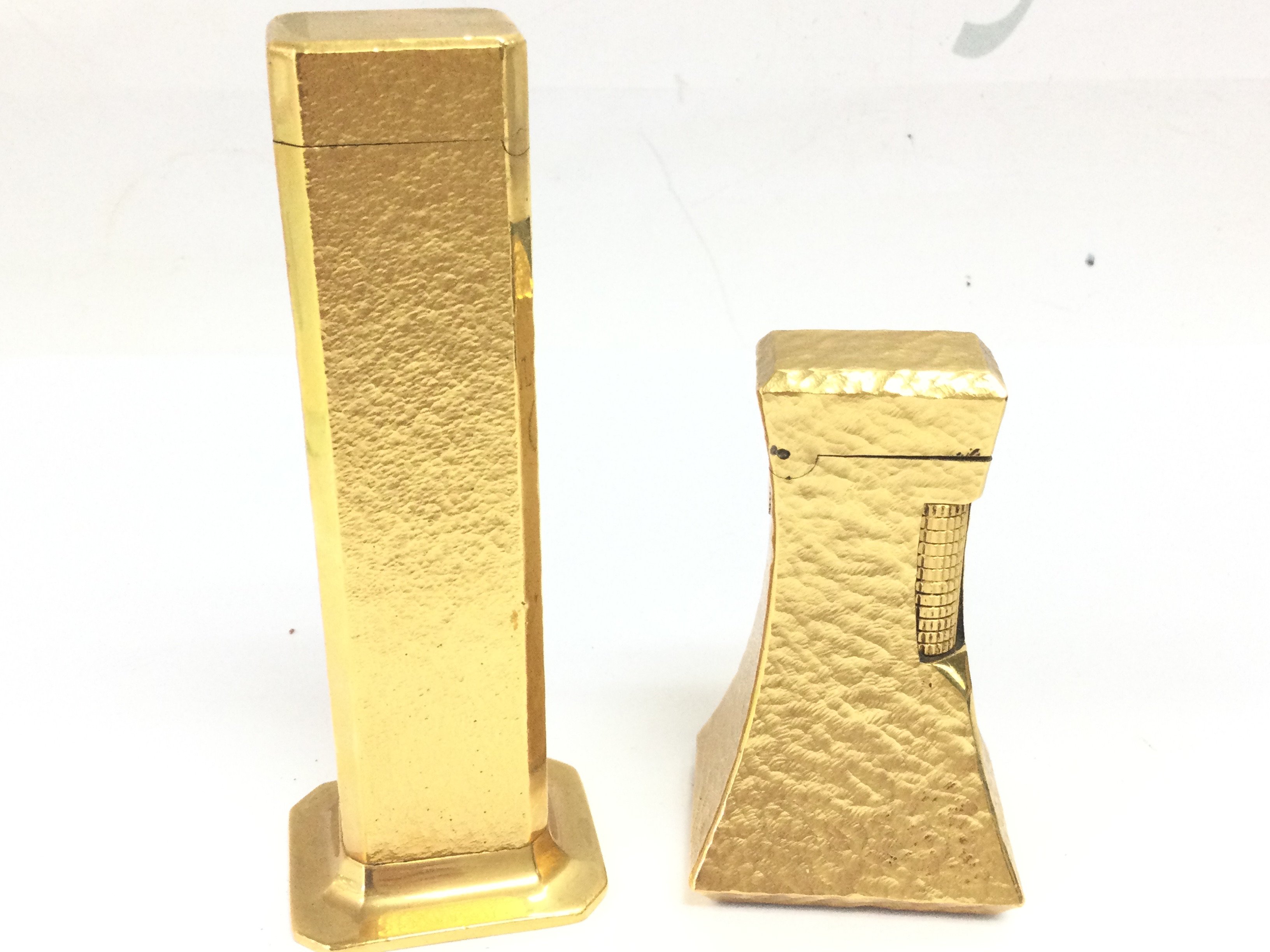 A Dunhill tall boy lighter and one other Dunhill lighter. Postage category A