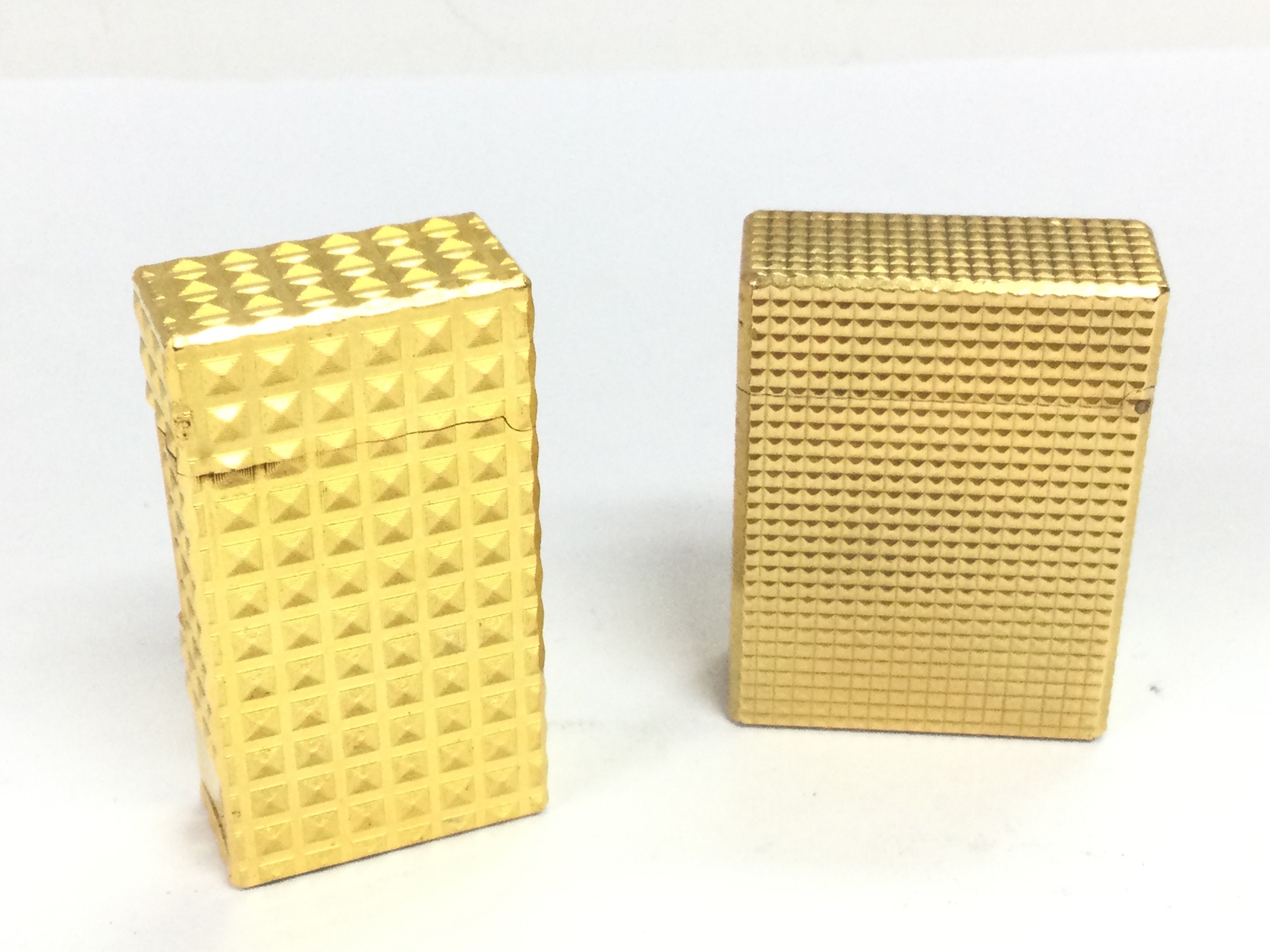 A DuPont and Vinci lighter. Postage category A