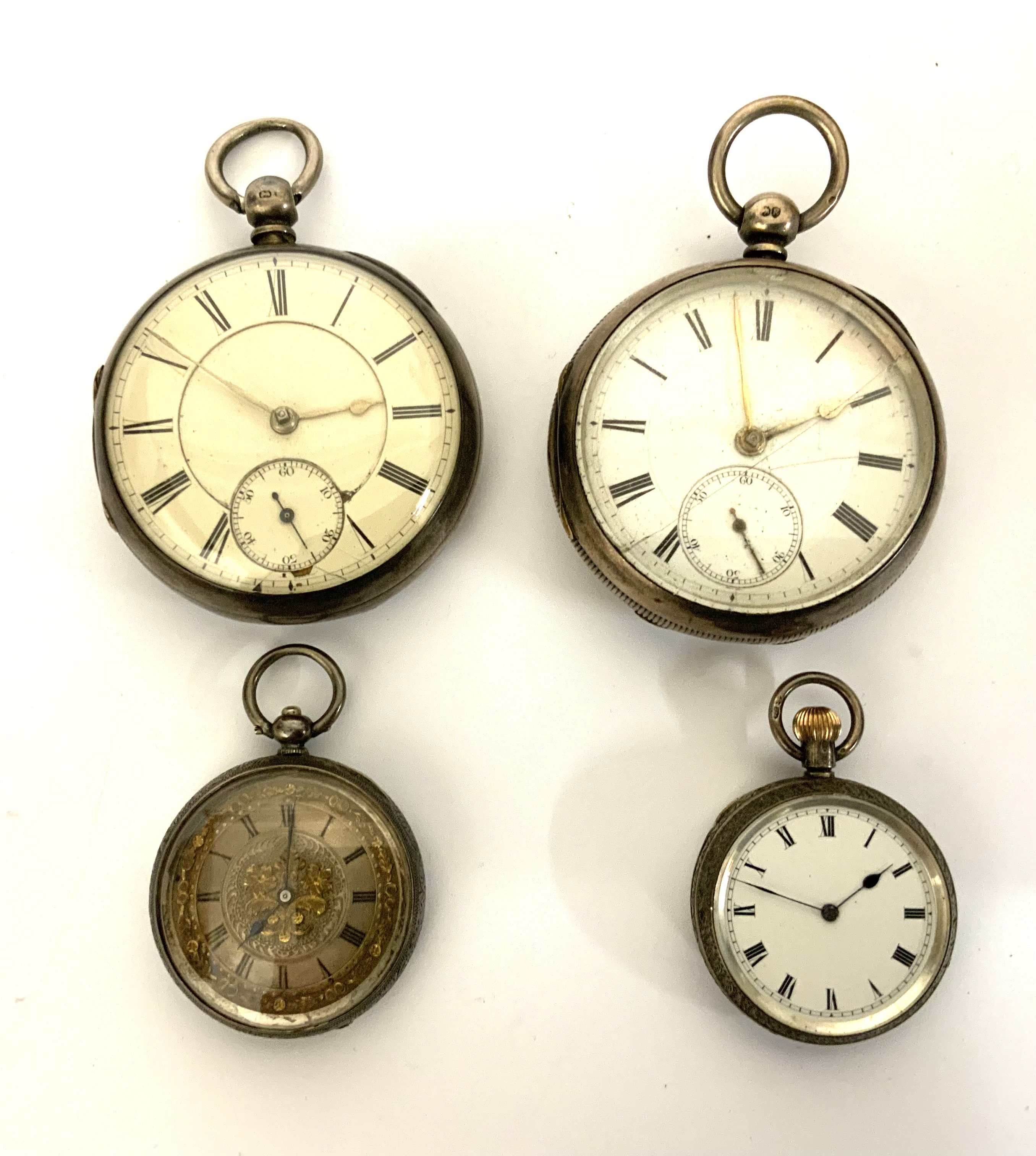 4 cased silver pocket watches. (A)
