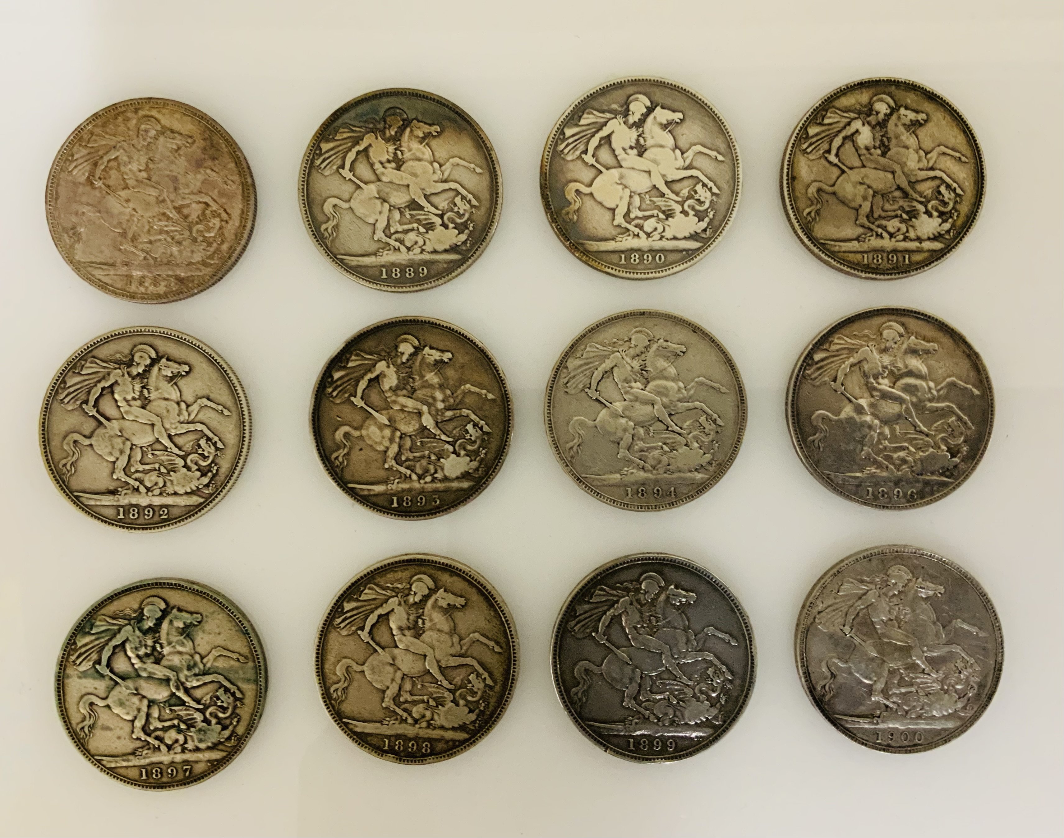 A good collection of 12 Victoria crowns. Dates include. 1887, 1889, 1890, 1891, 1892, 1893, 1894, 1896, 1897, 1898, 1899, 1900. (A)