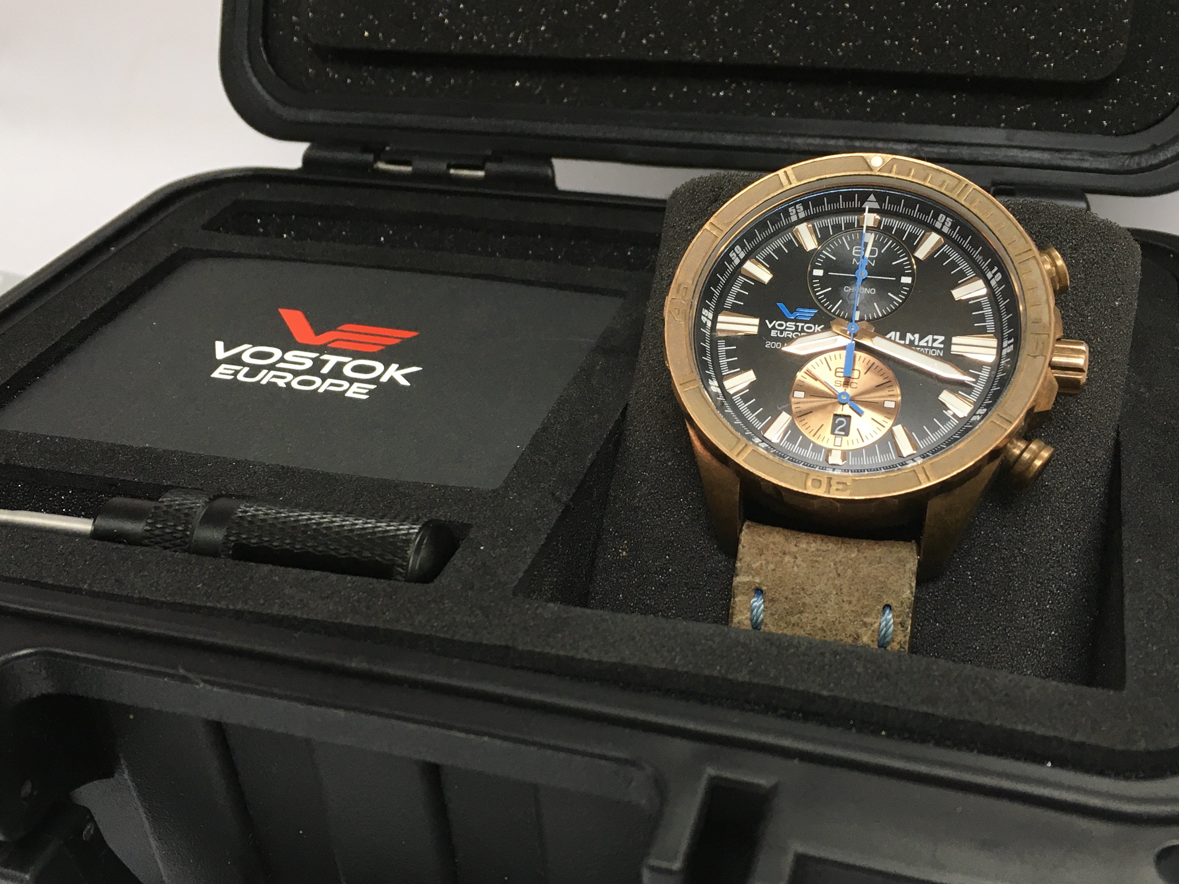 A cased mens Vostok 200 metres Almaz space station chronograph watch . Seen working. Postage category B
