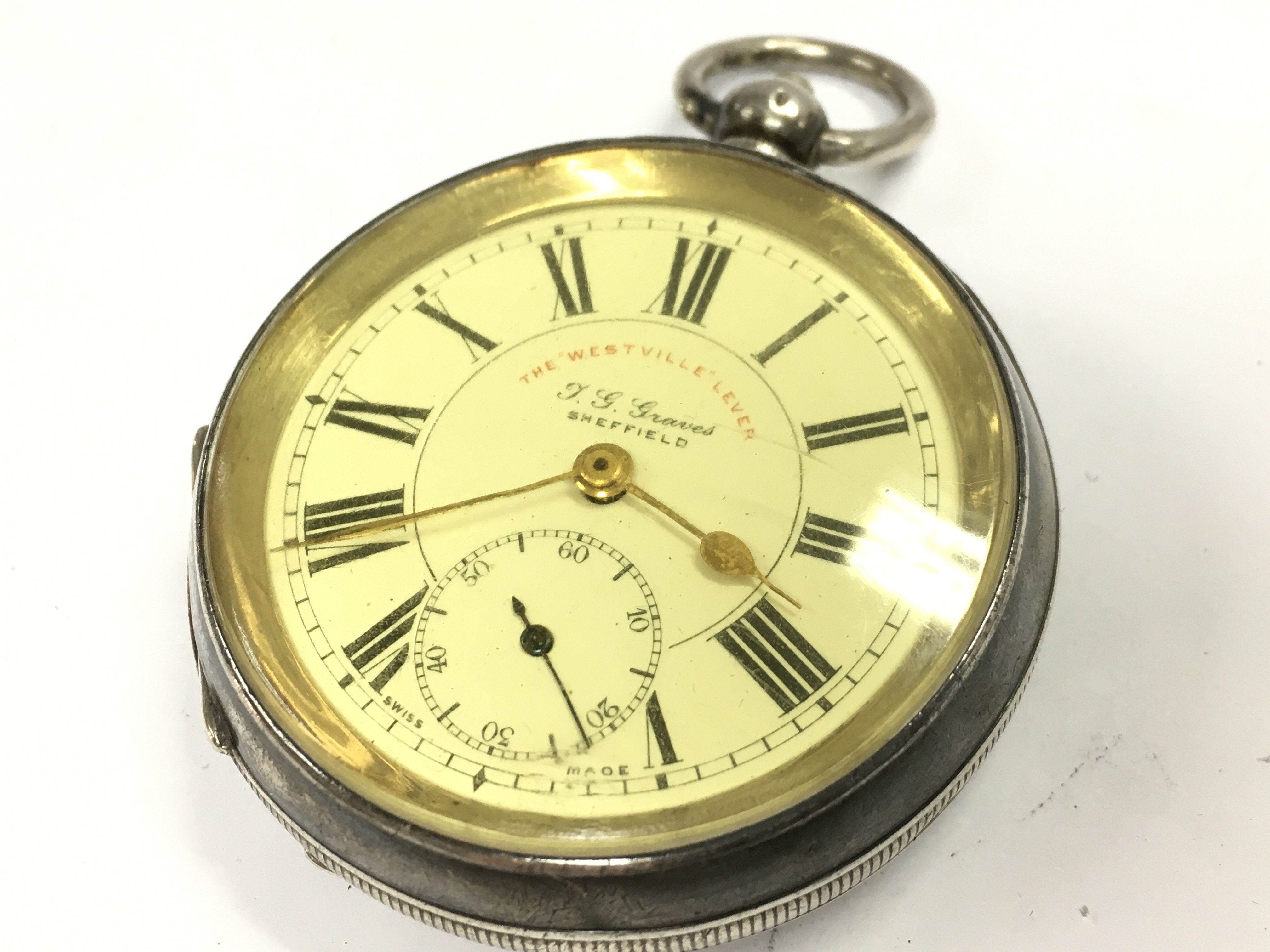 A full hunter silver cased J.G. Graves Sheffield pocket watch marked 935. Postage category A