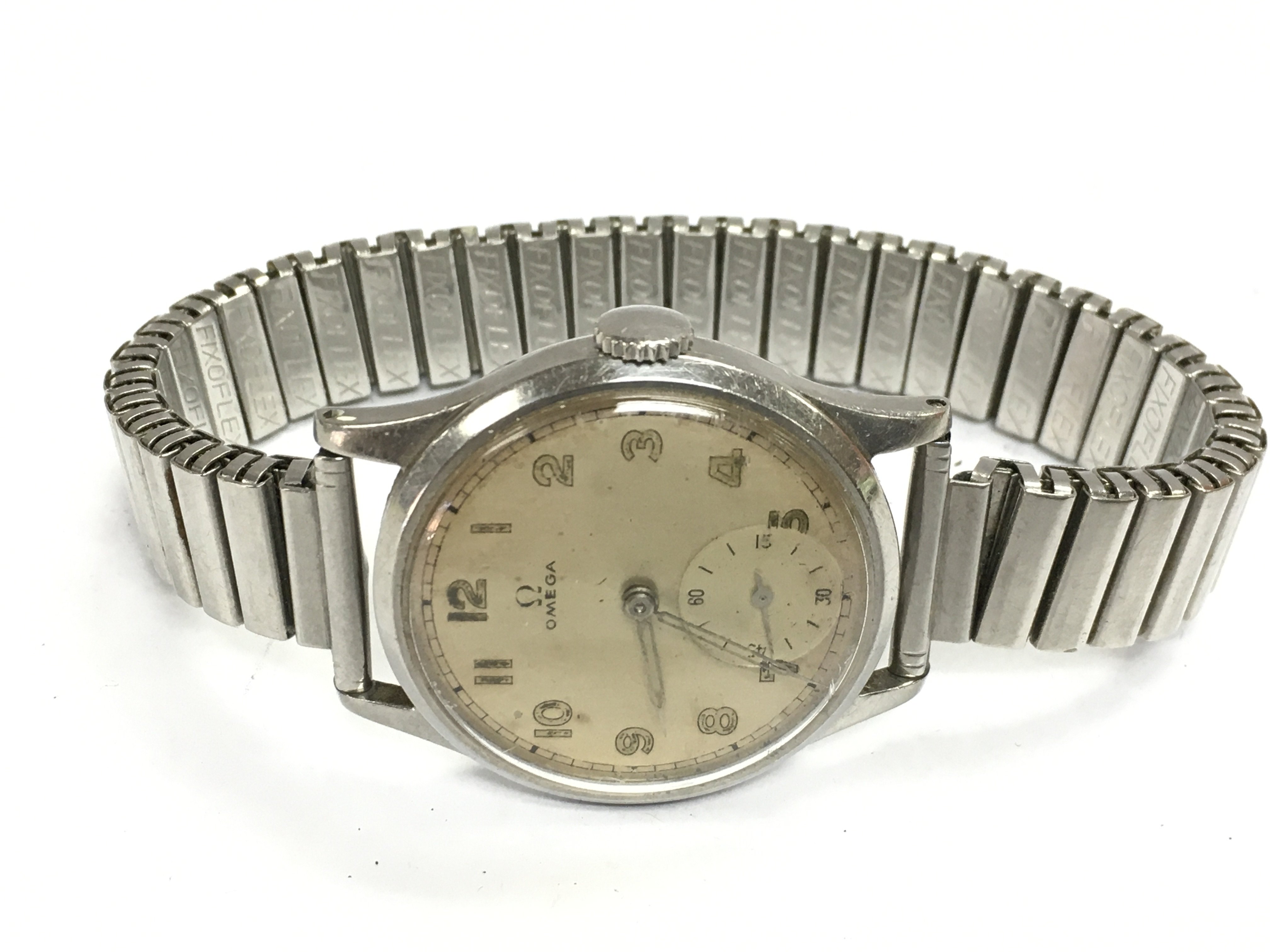 A 1940s chrome plated gents mid size Omega watch . Postage category A