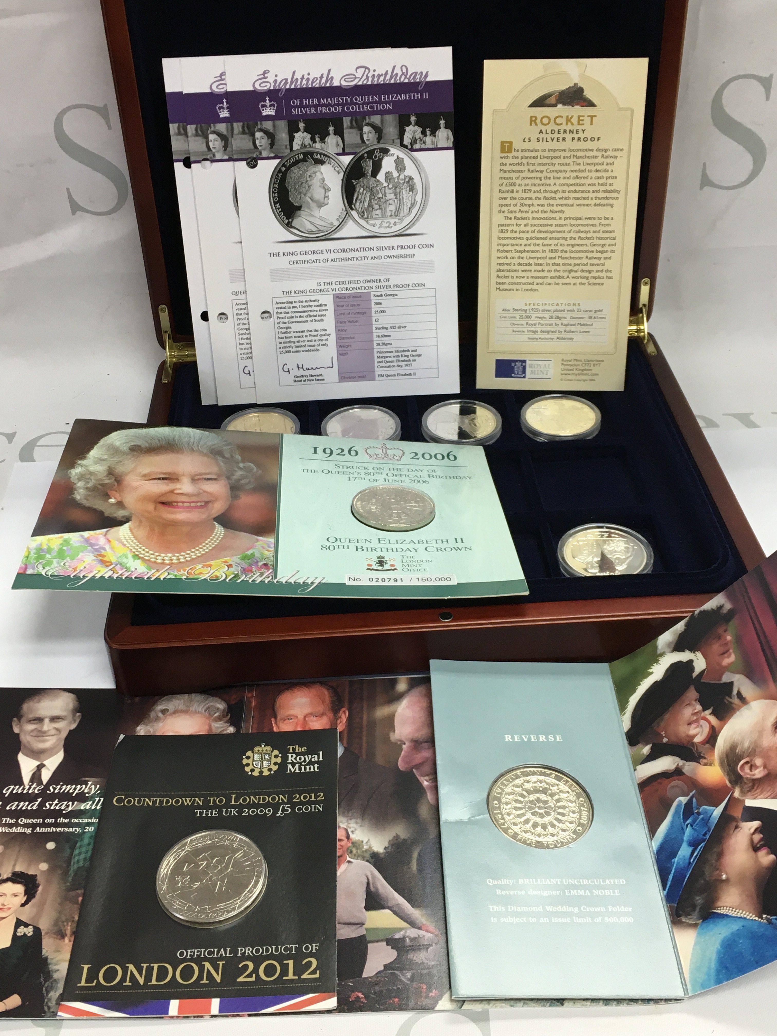 Five sterling silver commemorative coins and three nickel silver presentation coins. Postage category B