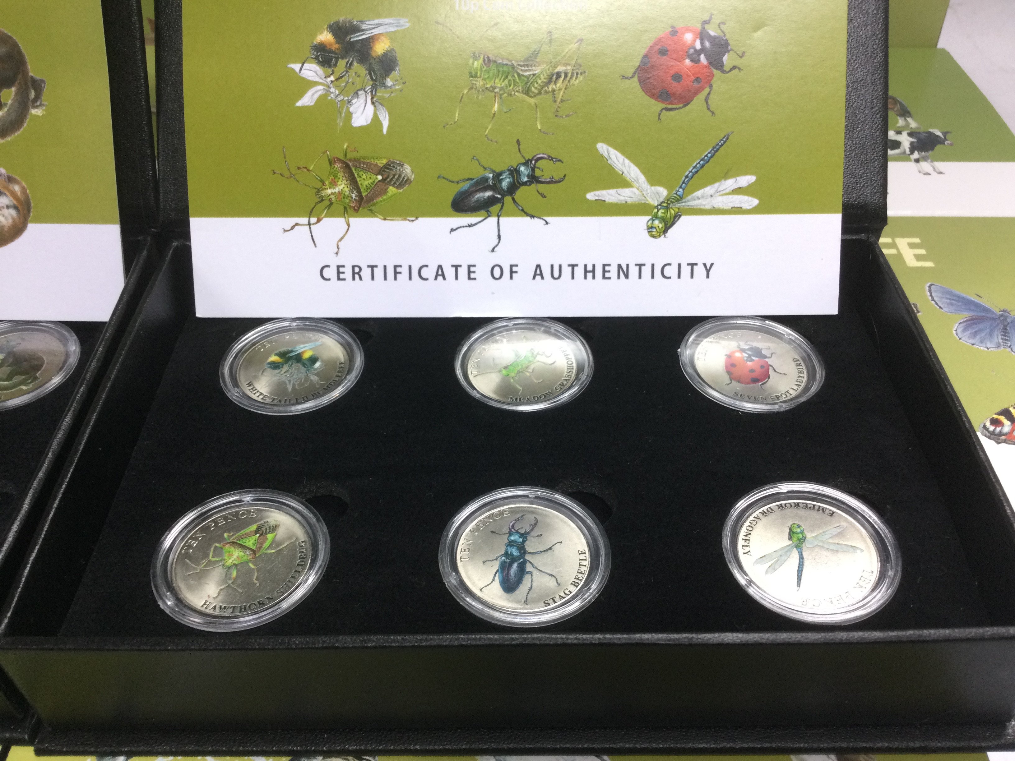 Fourteen boxed Wildlife 10p coin sets. Shipping category B.