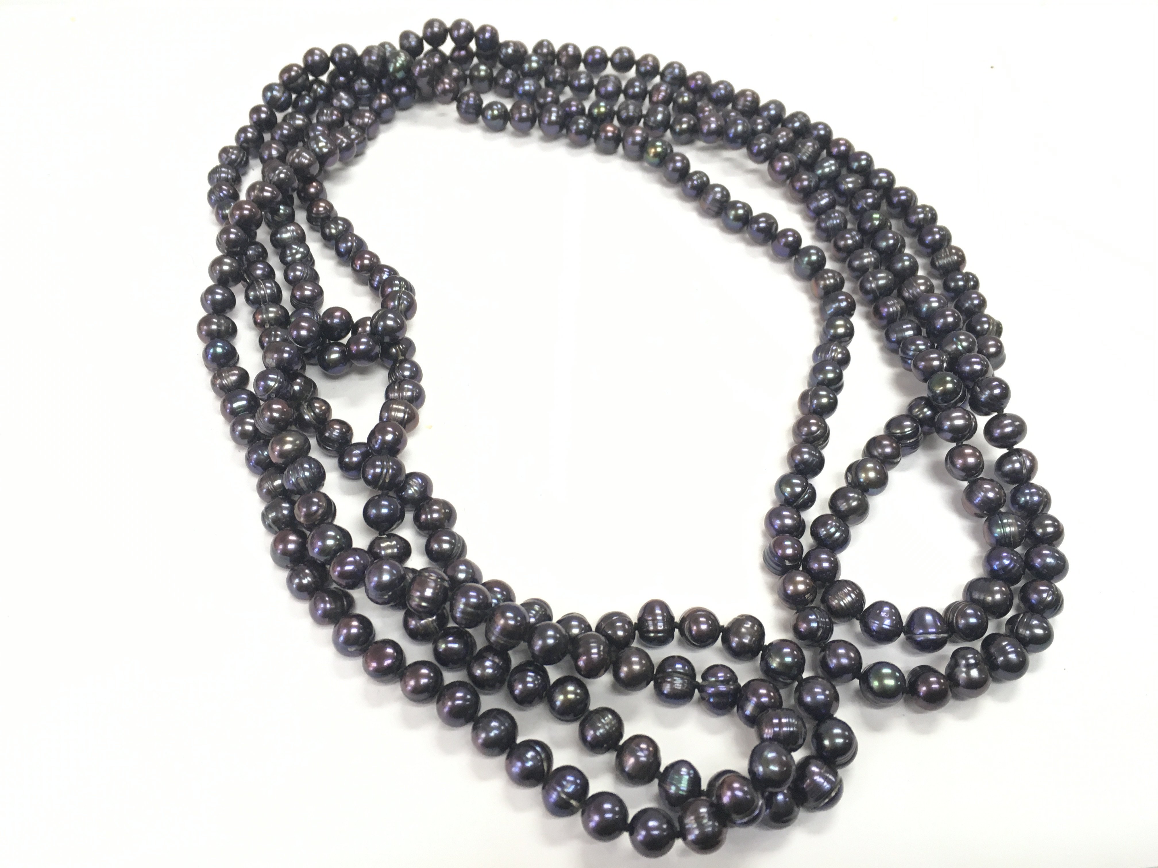 Coloured pearl longguard , 122cm long. Postage category A