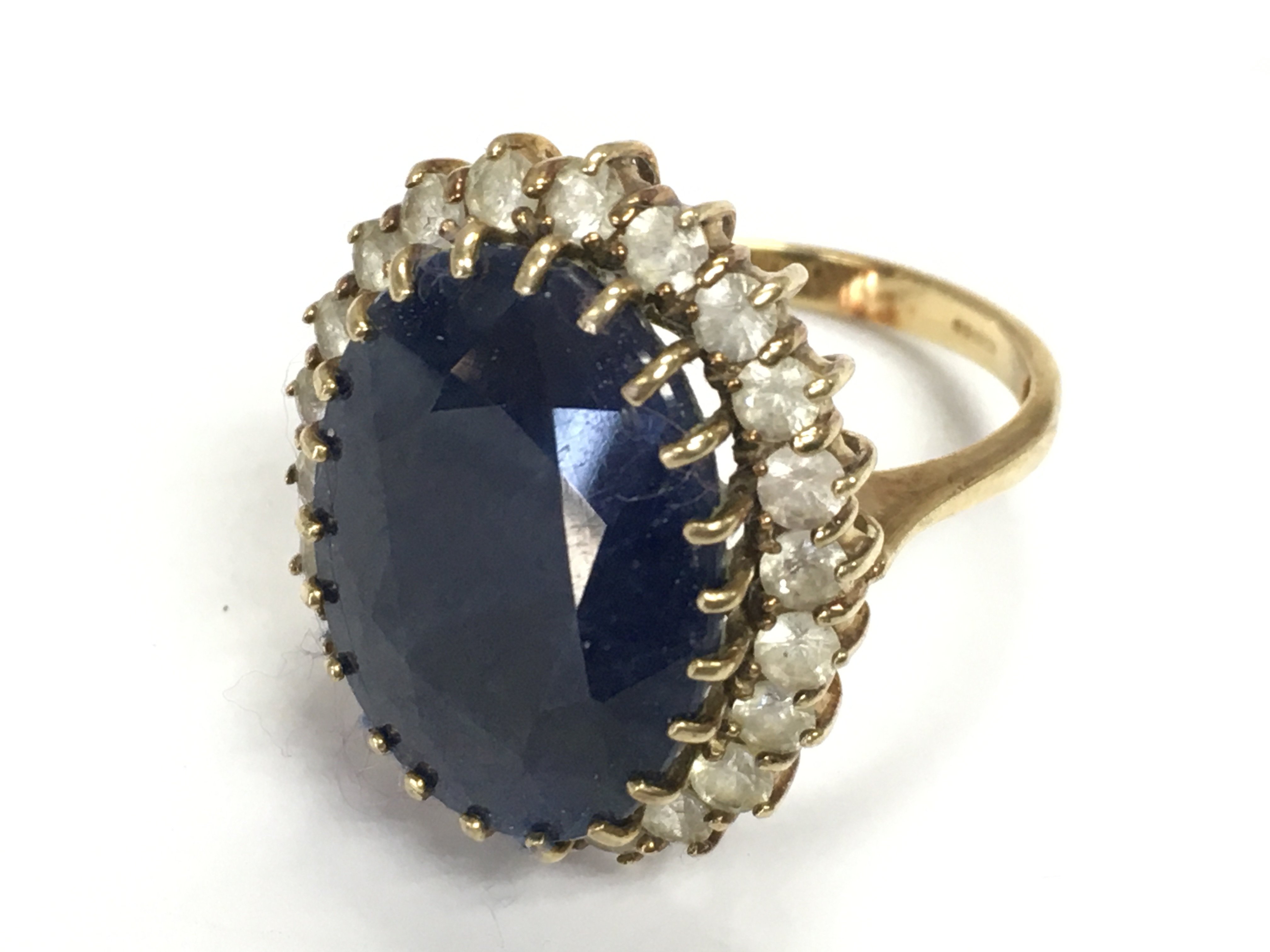 A 9 carat gold sapphire ring , size S. 10.3g postage category A