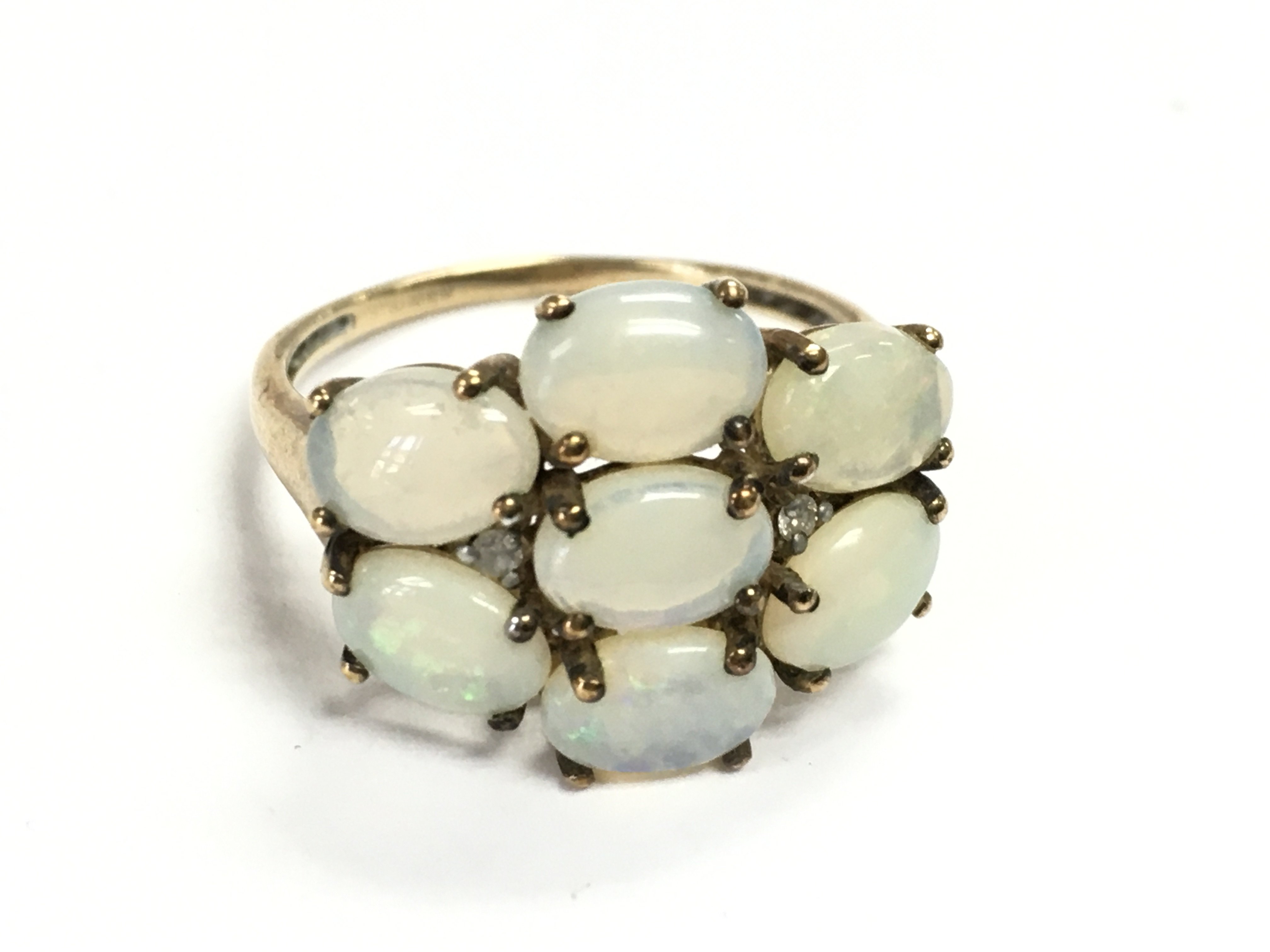 A 9 carat gold opal set ring , 3g total weight. R/S Postage category A