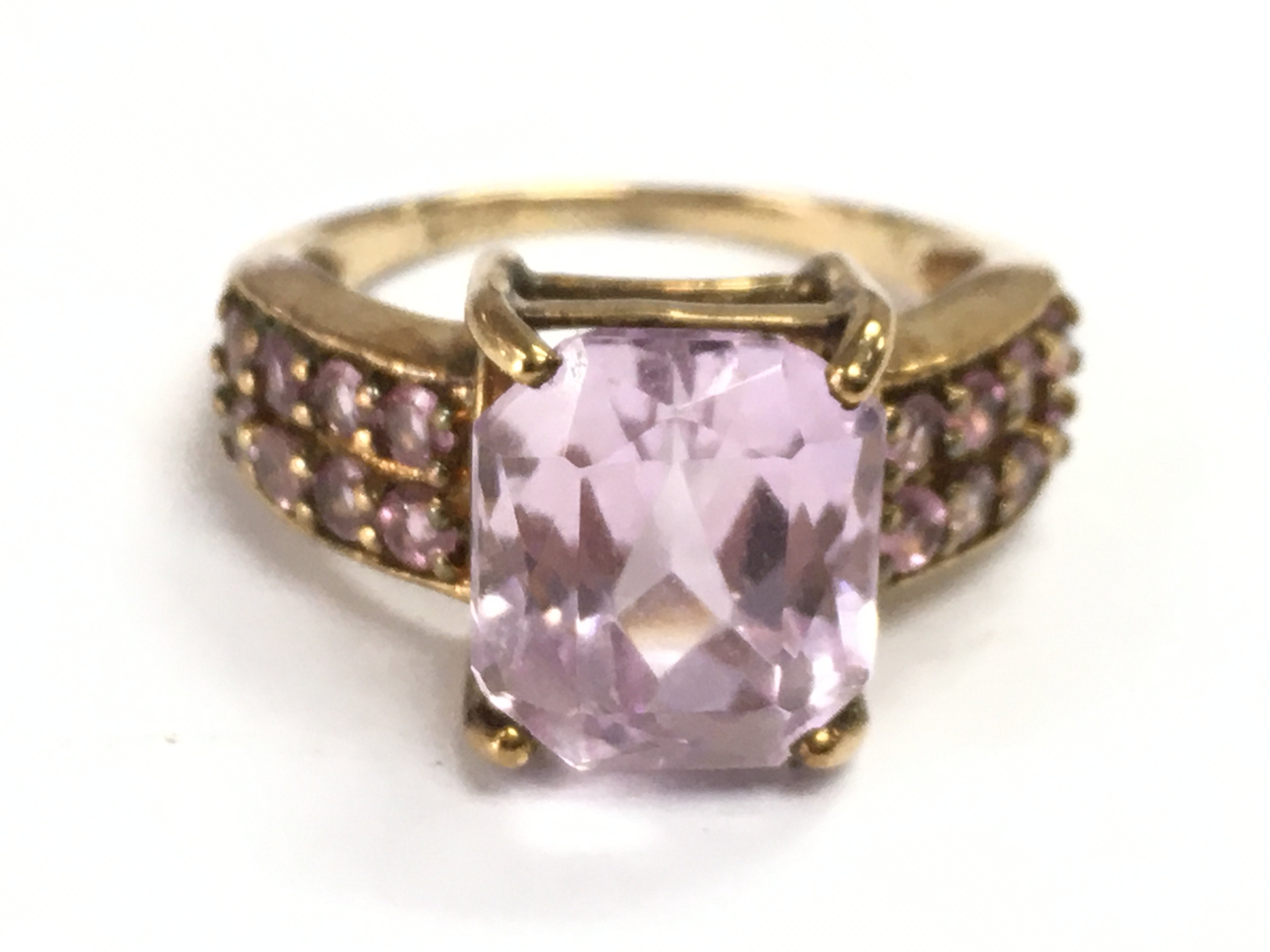 A 9 carat gold Kunzite ring, size N . 4.5g total weight Postage category A