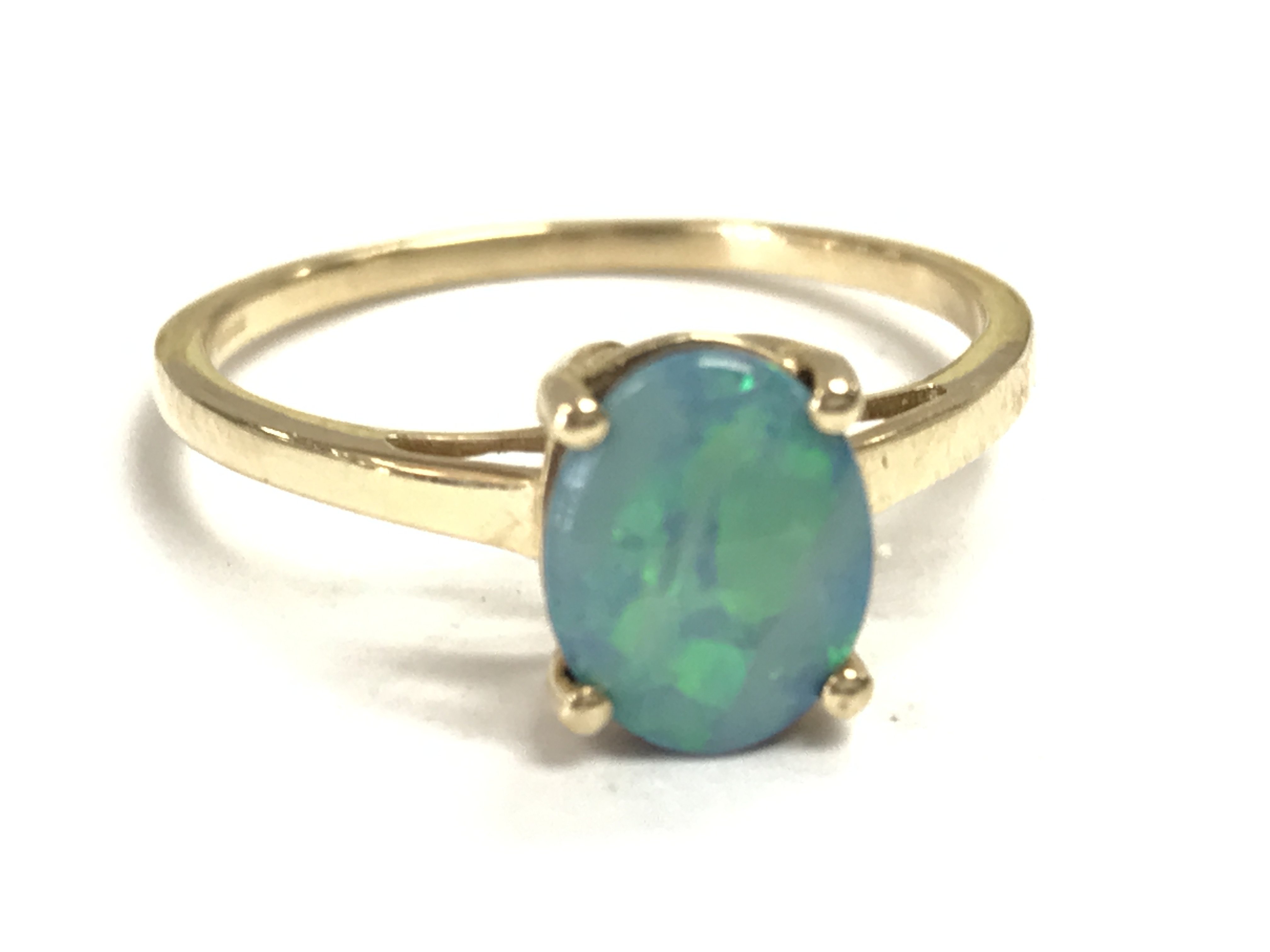 A Opal Solitaire 9ct gold ring, 1.99g . Size S. postage category A