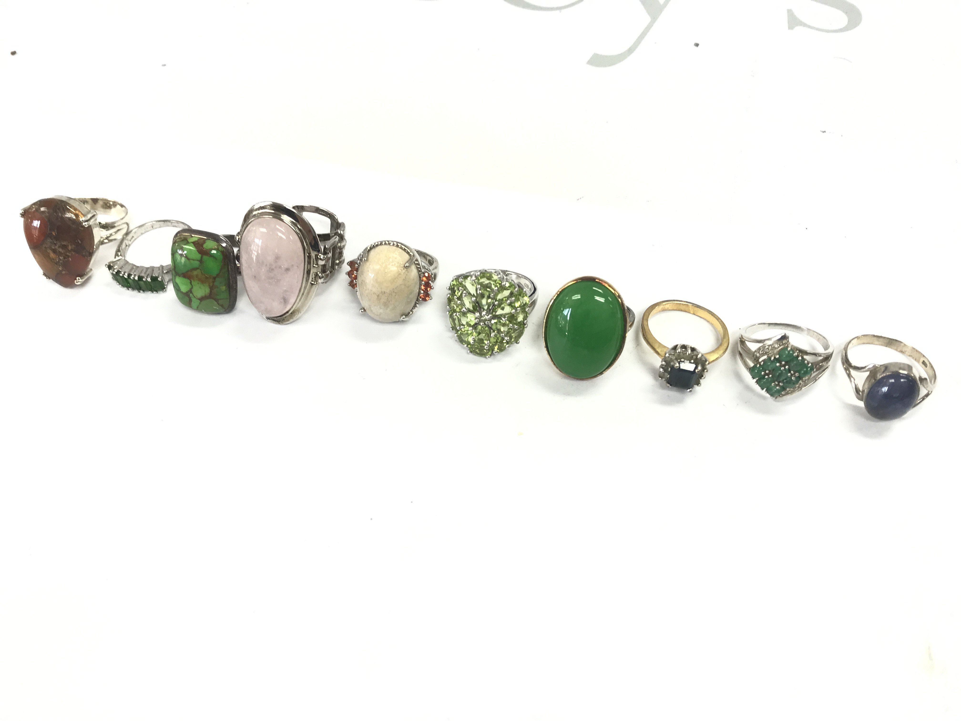 A collection of silver and costume rings . Postage category A