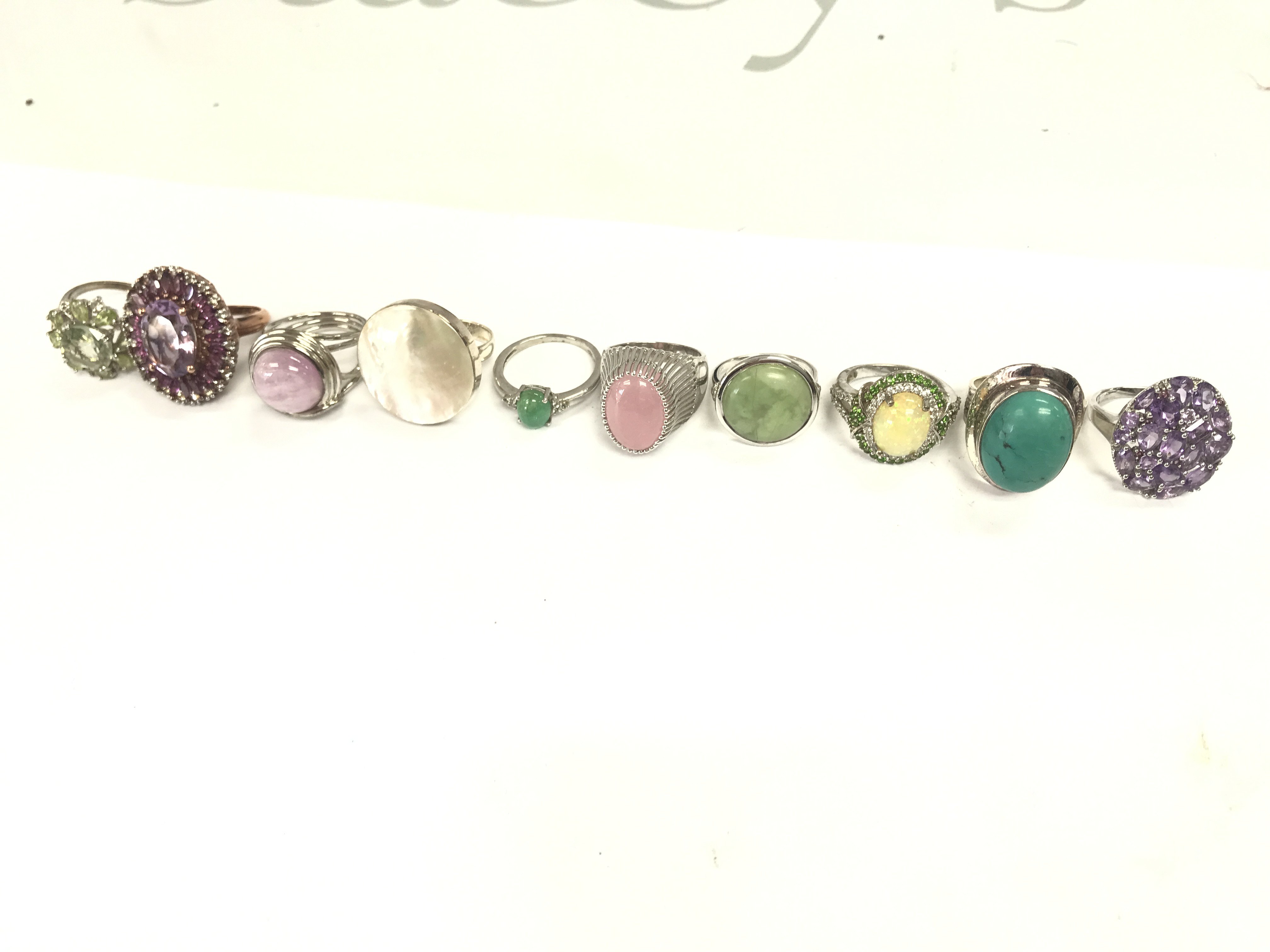 A Collection of silver rings . Postage category A