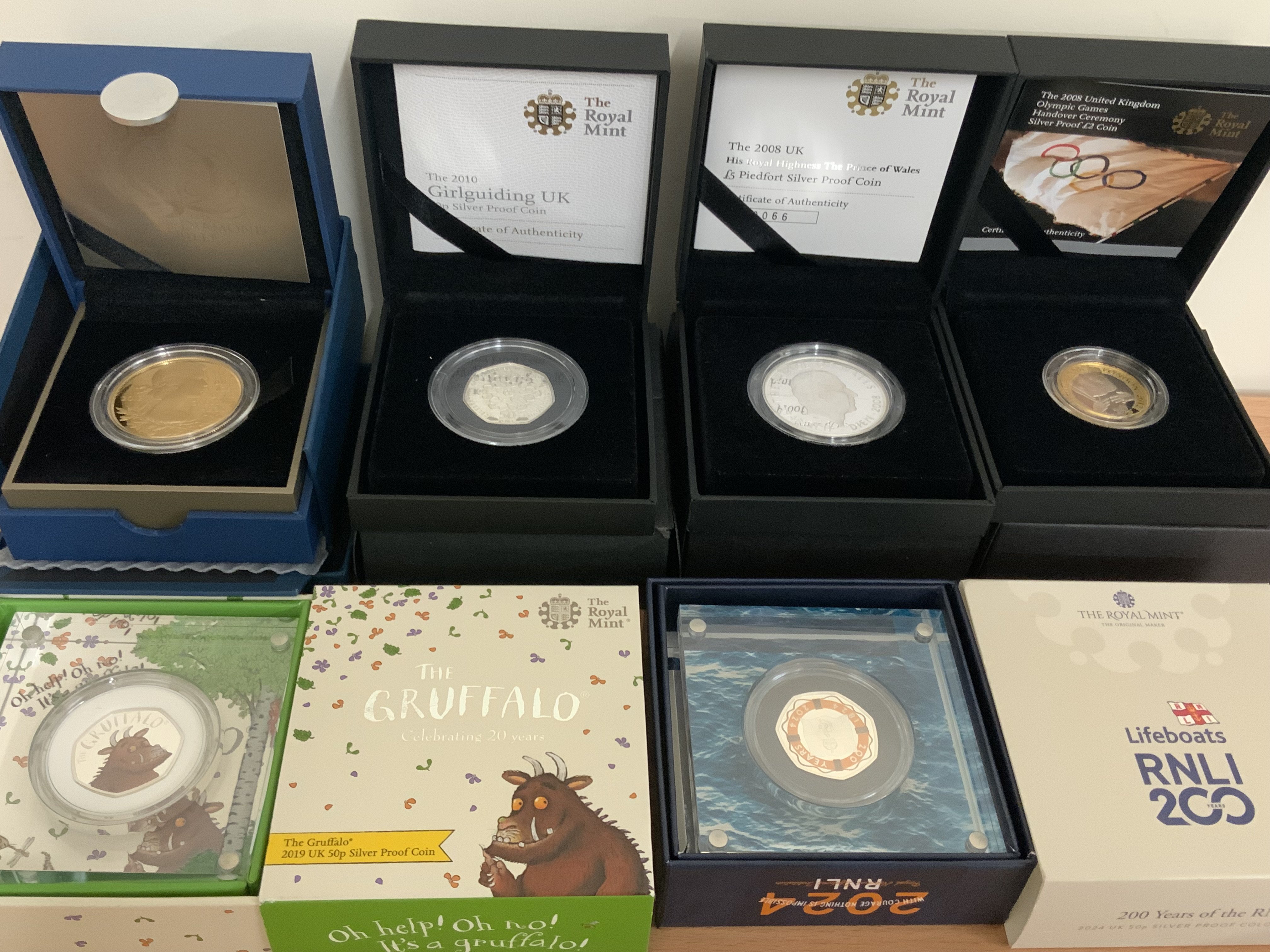 9 Royal Mint issue commemorative silver coins. (B)