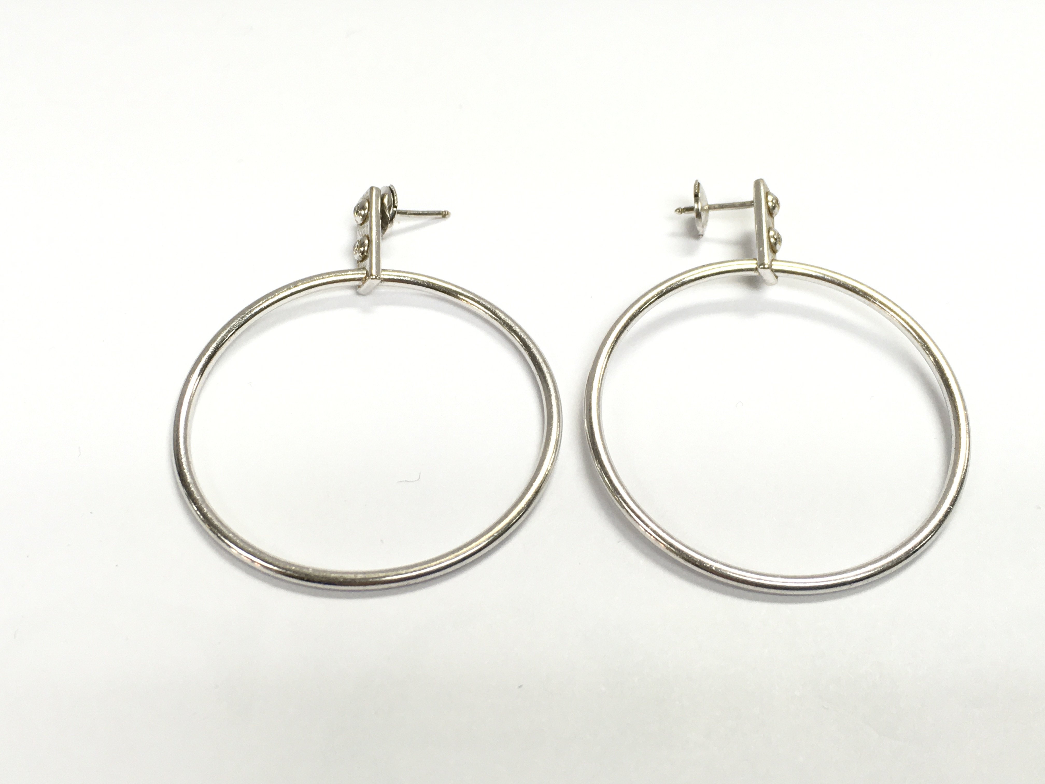 A pair of 18ct white gold Louis Vuitton earrings. 11.80g
