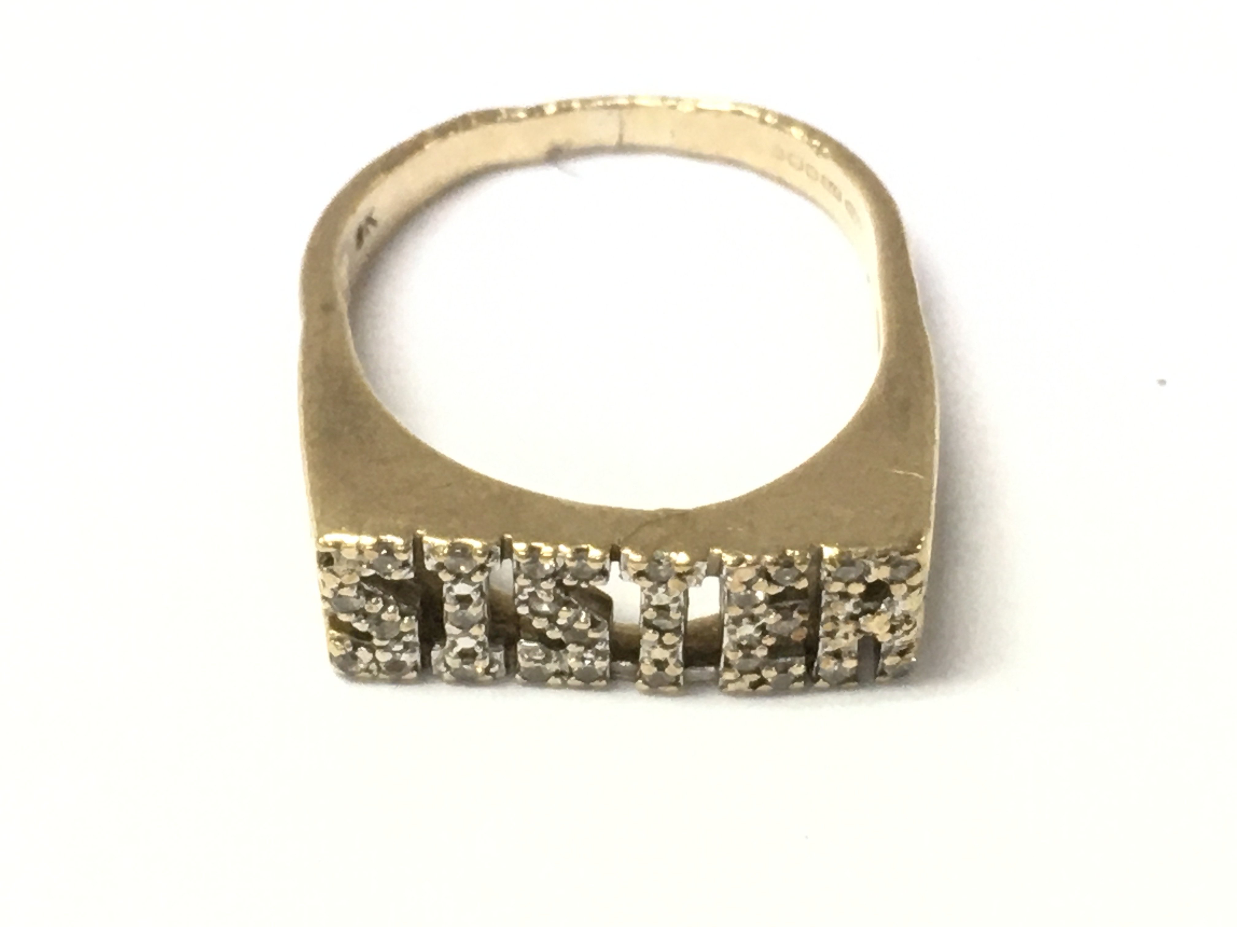 A 9ct gold diamond sister ring. Size M and 3.5g Postage A