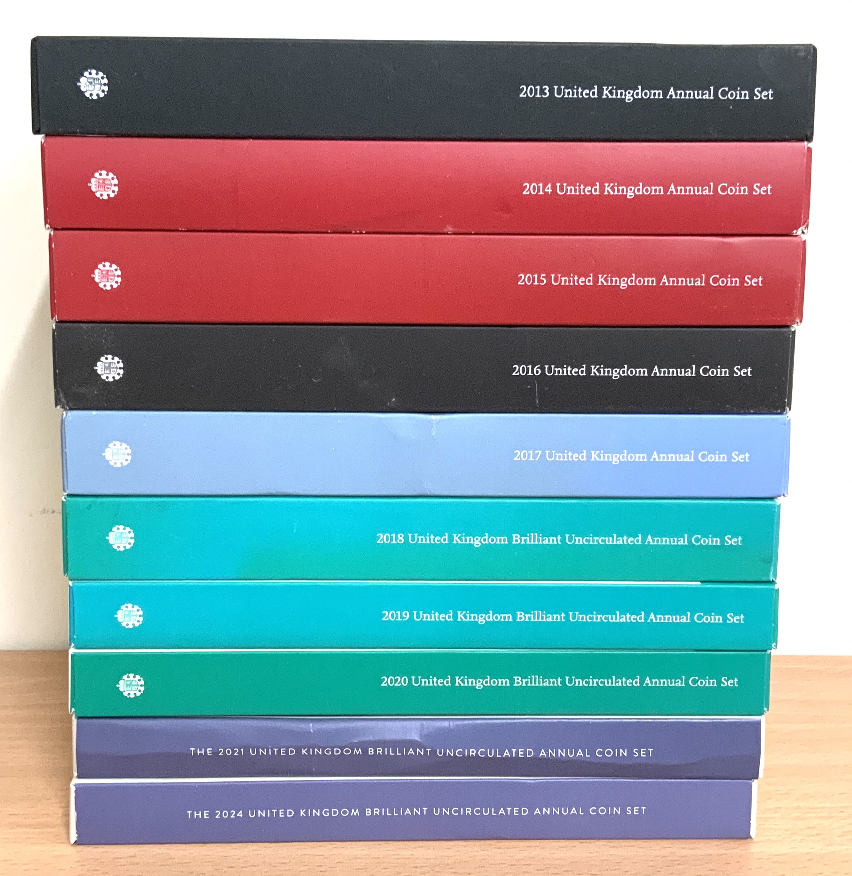 10 Royal Mint United Kingdom annual coin sets. 2013-21, 2024. (B)