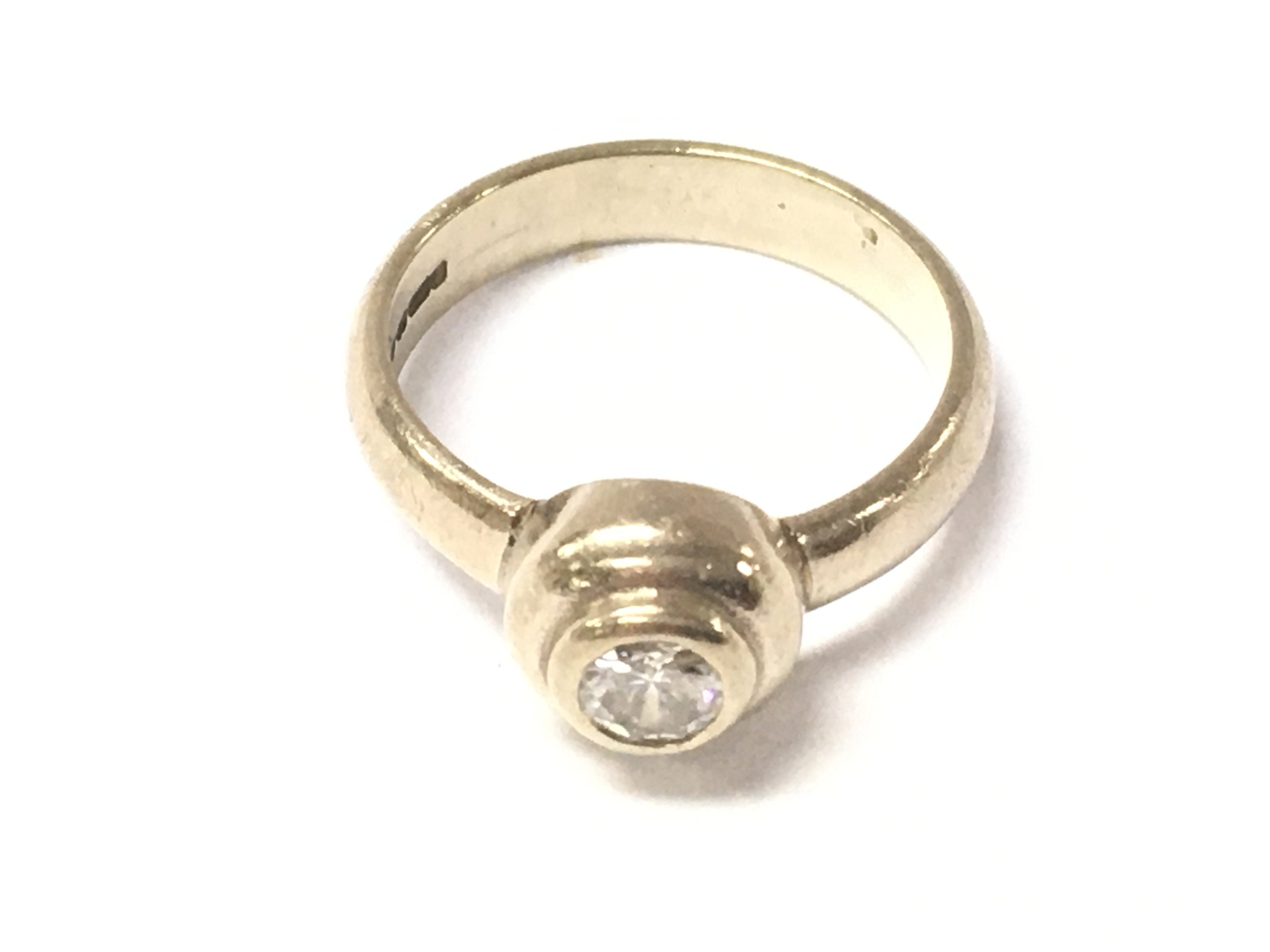 An 18ct white gold diamond ring. Size K and 5g