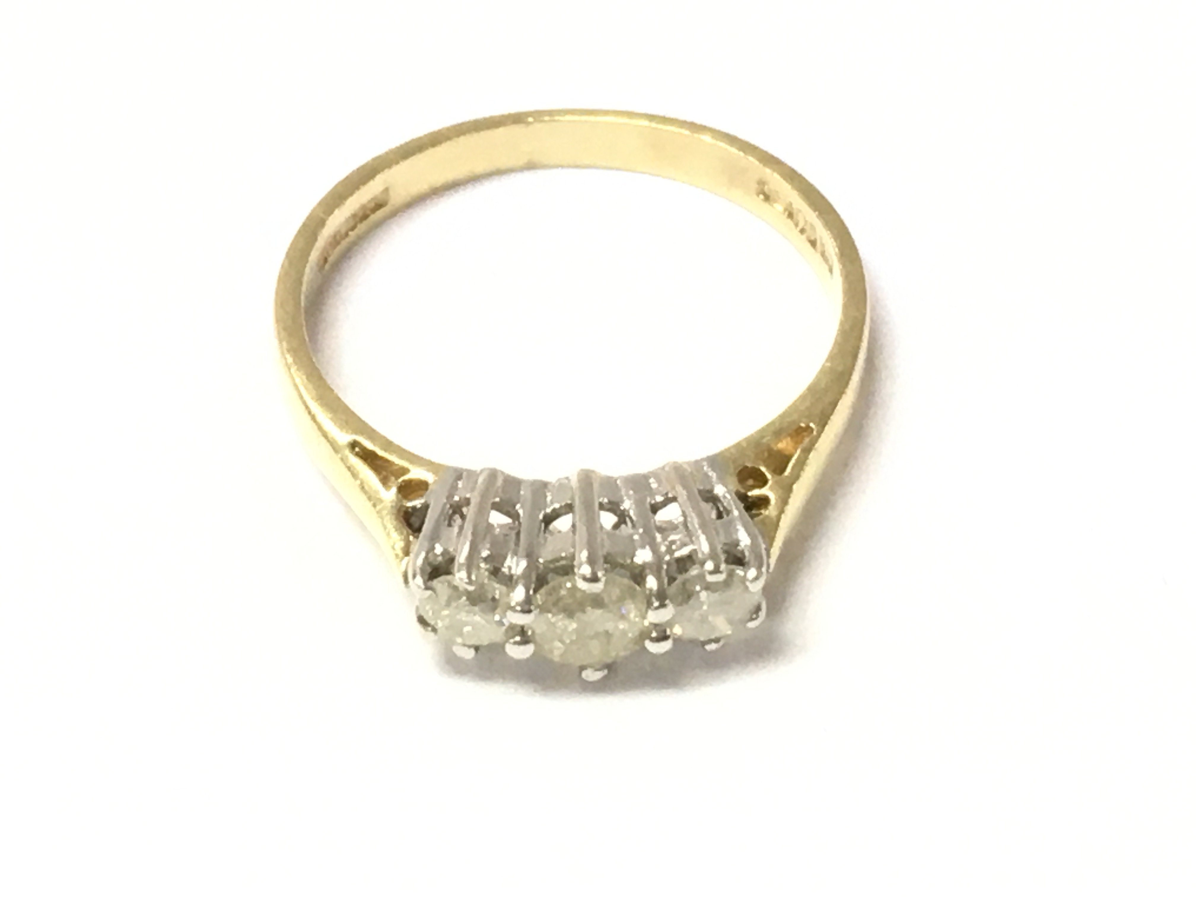 An 18ct 3 stone diamond ring Approx 1/2 ct size L and 2.6g