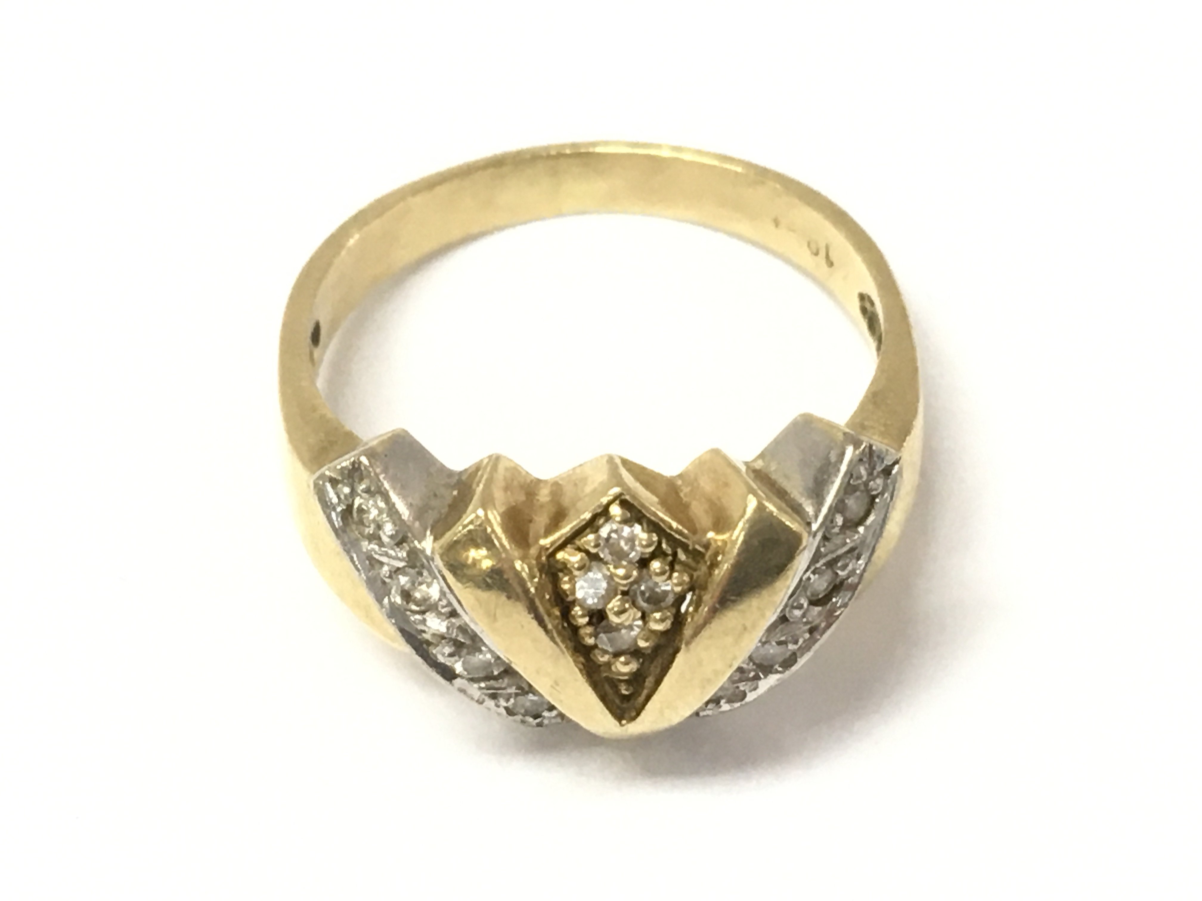 An 18ct yellow and white gold diamond ring. Size L and 4.16g