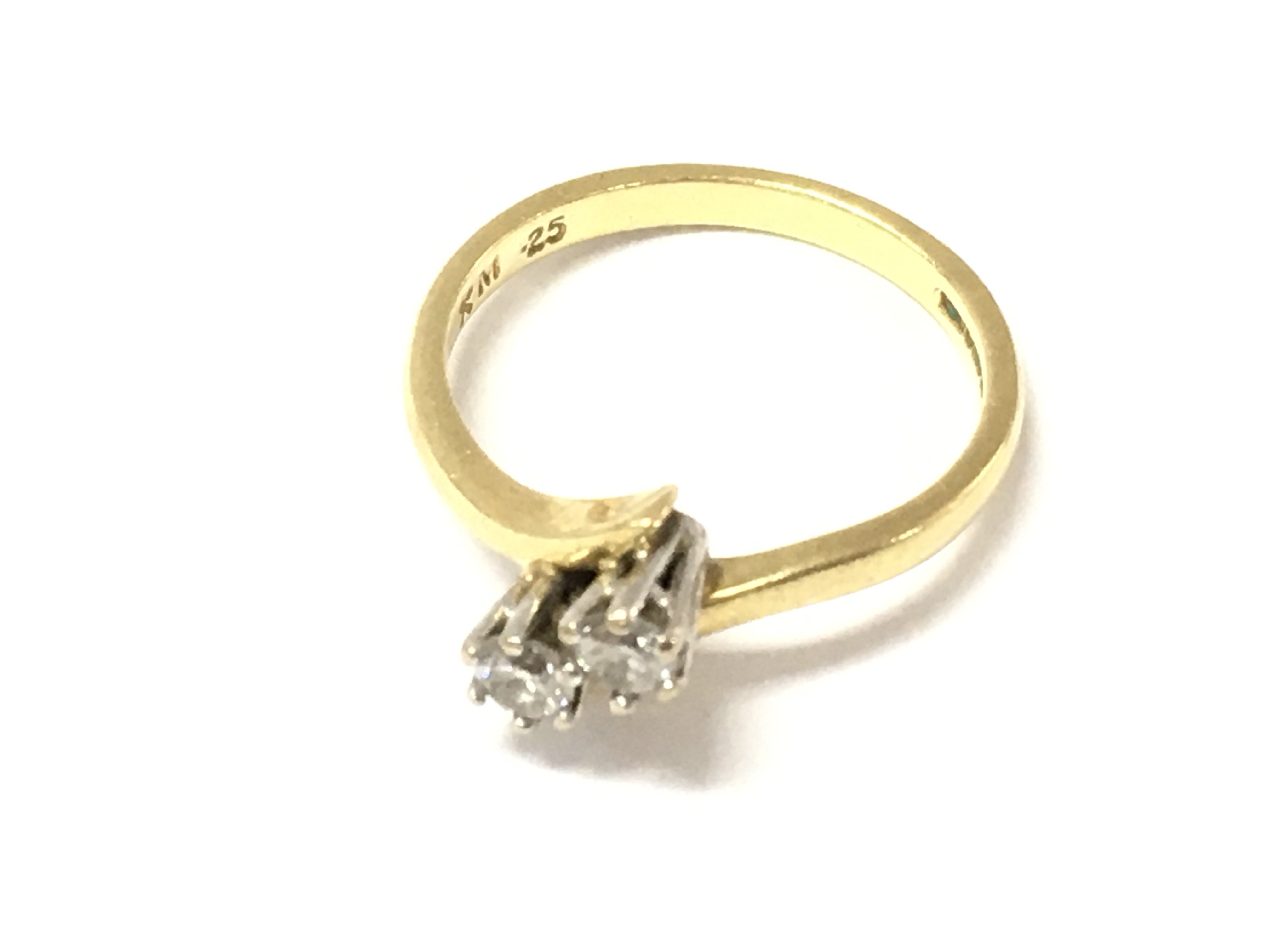 An 18ct gold 2 stone diamond ring 0.25ct size L and 3.2g