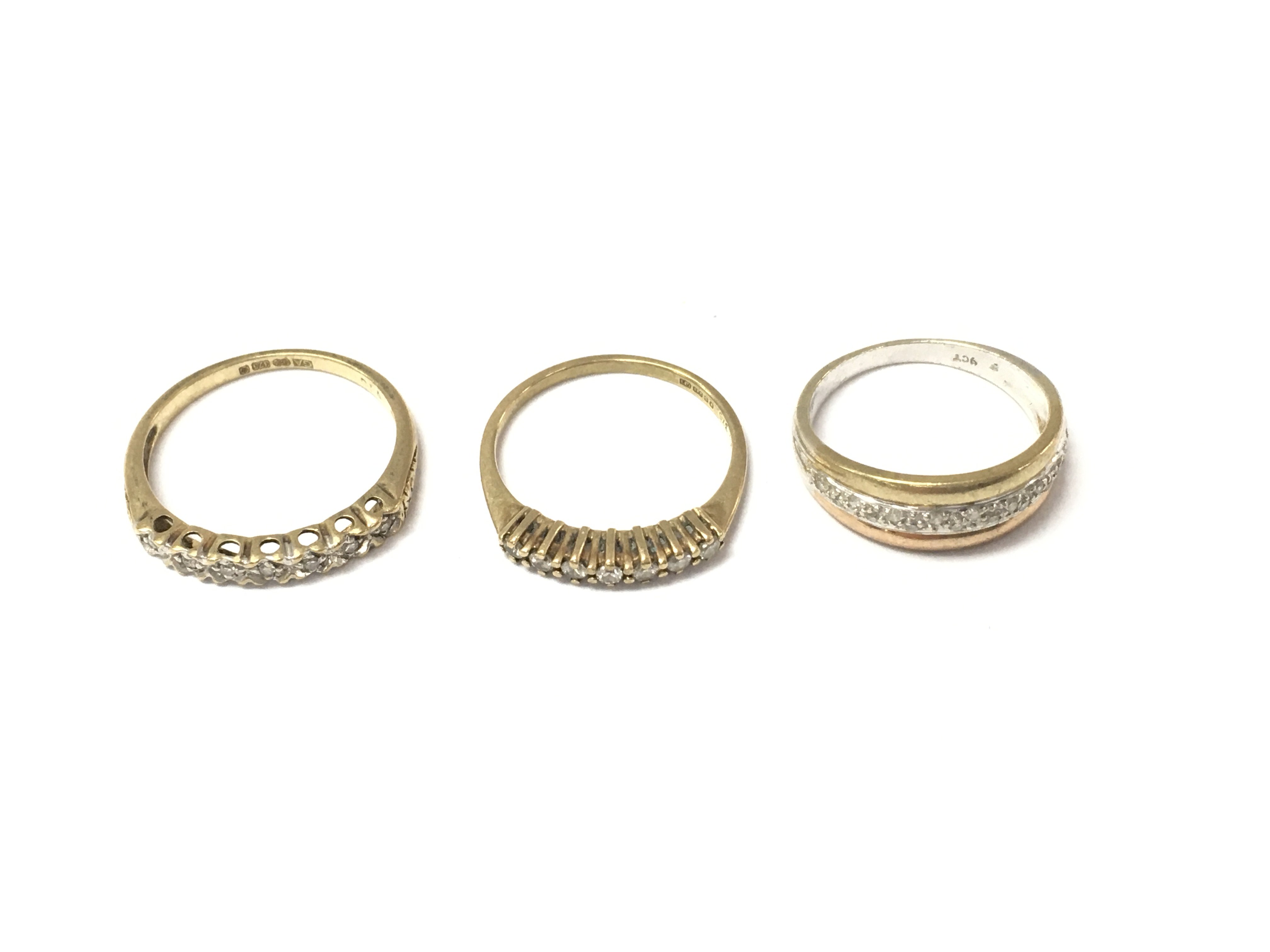 Three 9ct diamond 1/2 hoop rings. 5.82g