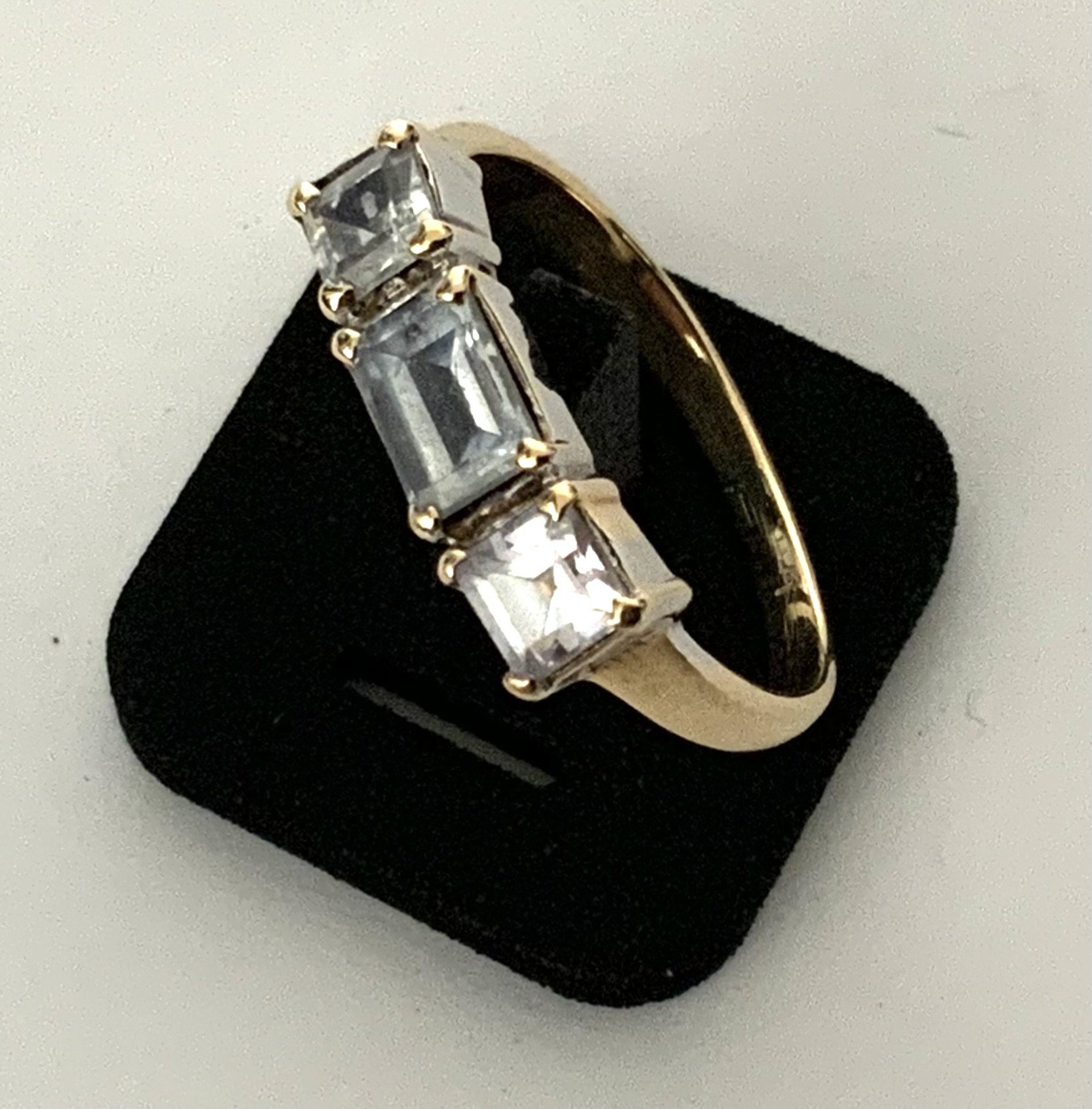 A 9ct gold and 3 stone set ring, Size L. (Unmarked gold).