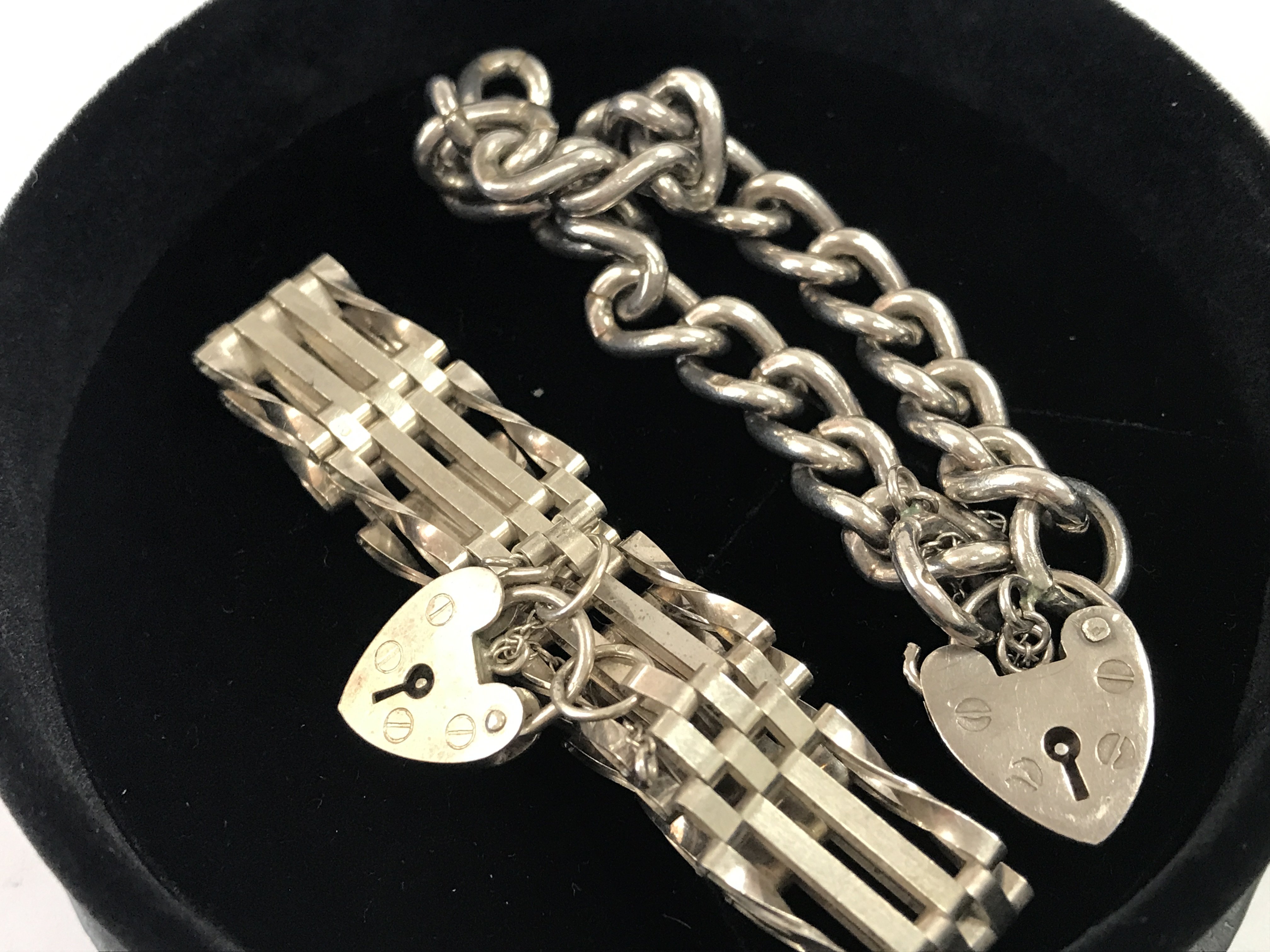 A silver Hallmarked bracelet and a silver gate bracelet . Postage category B