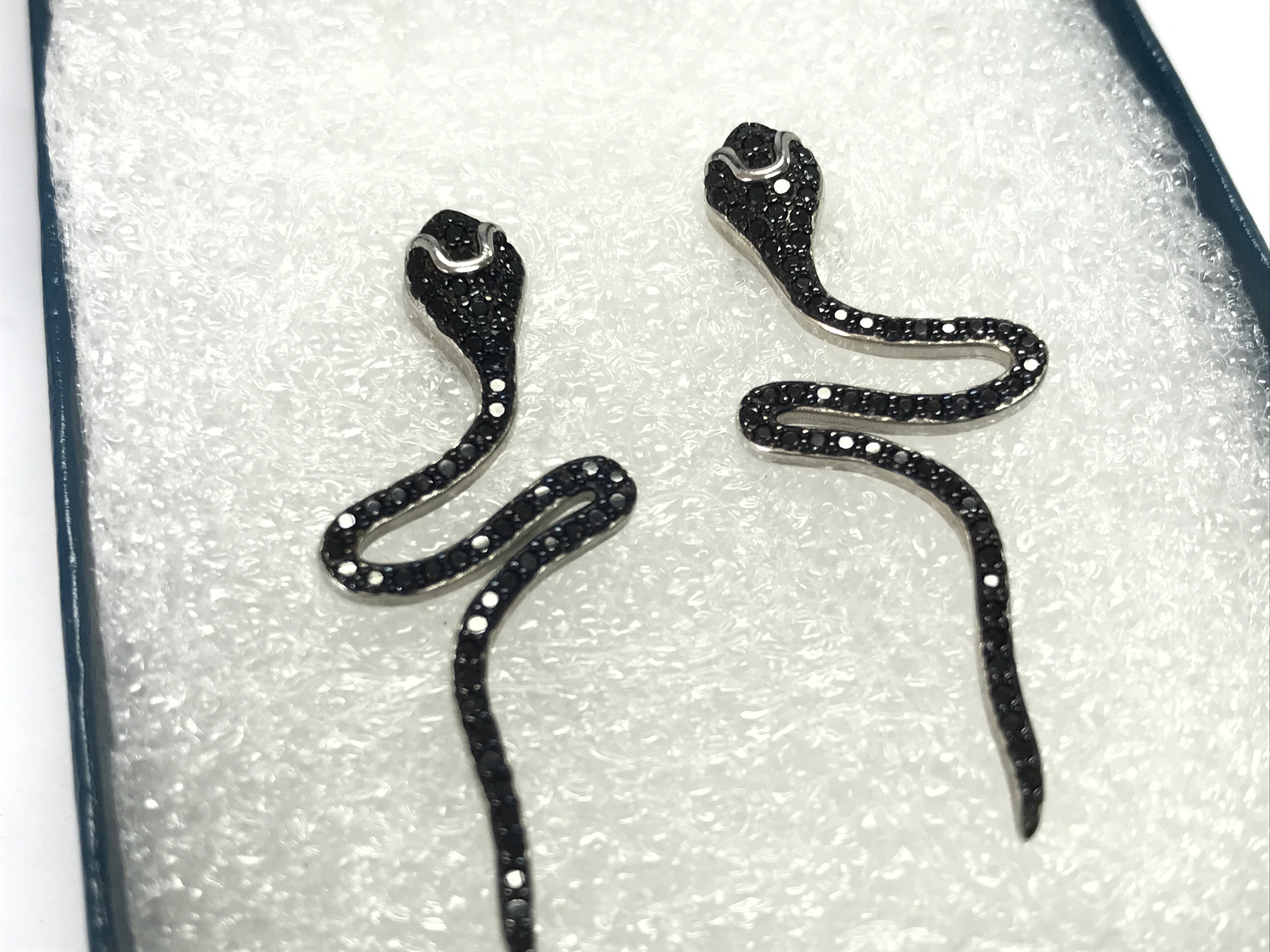 Silver snake earrings , postage category A