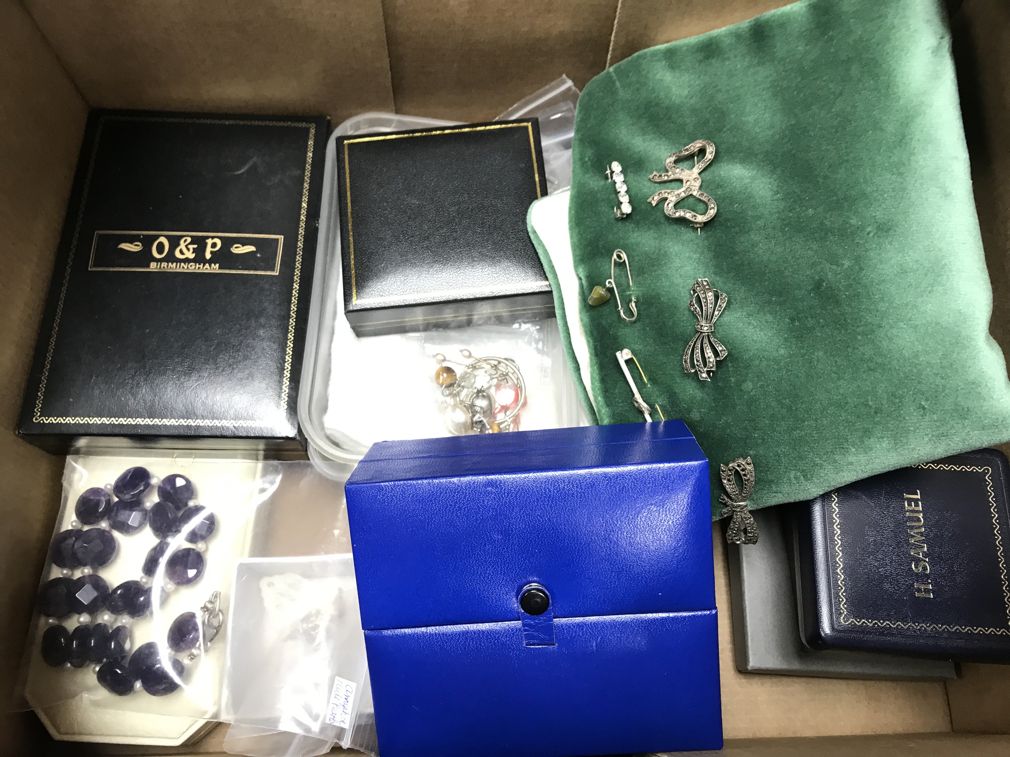 A collection of silver costume Jewellery including a collection of silver brooches, silver necklaces and earrings , some silver rings etc. postage category C