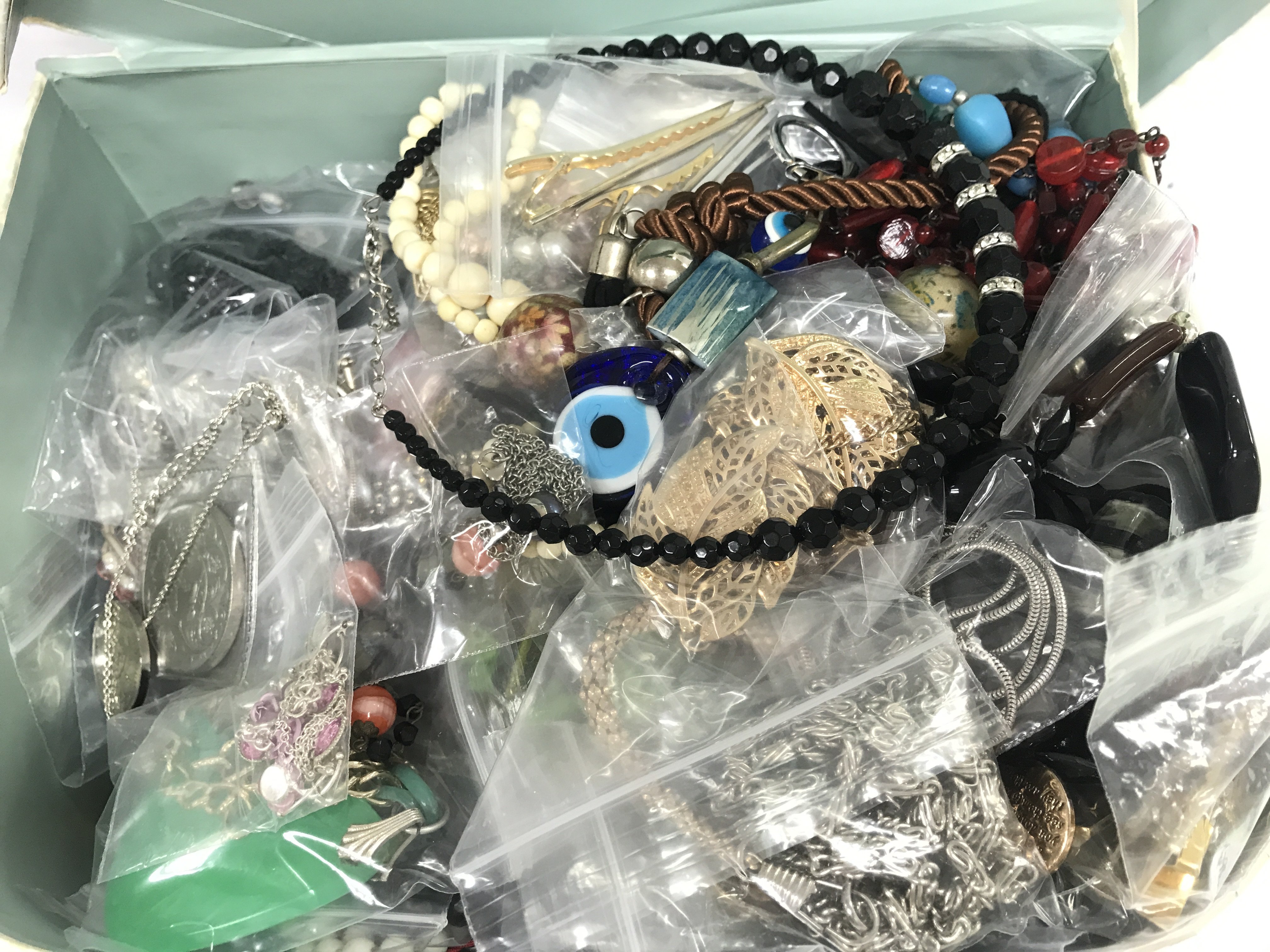 A Collection of costume jewellery including necklaces, bracelets etc . Postage category C