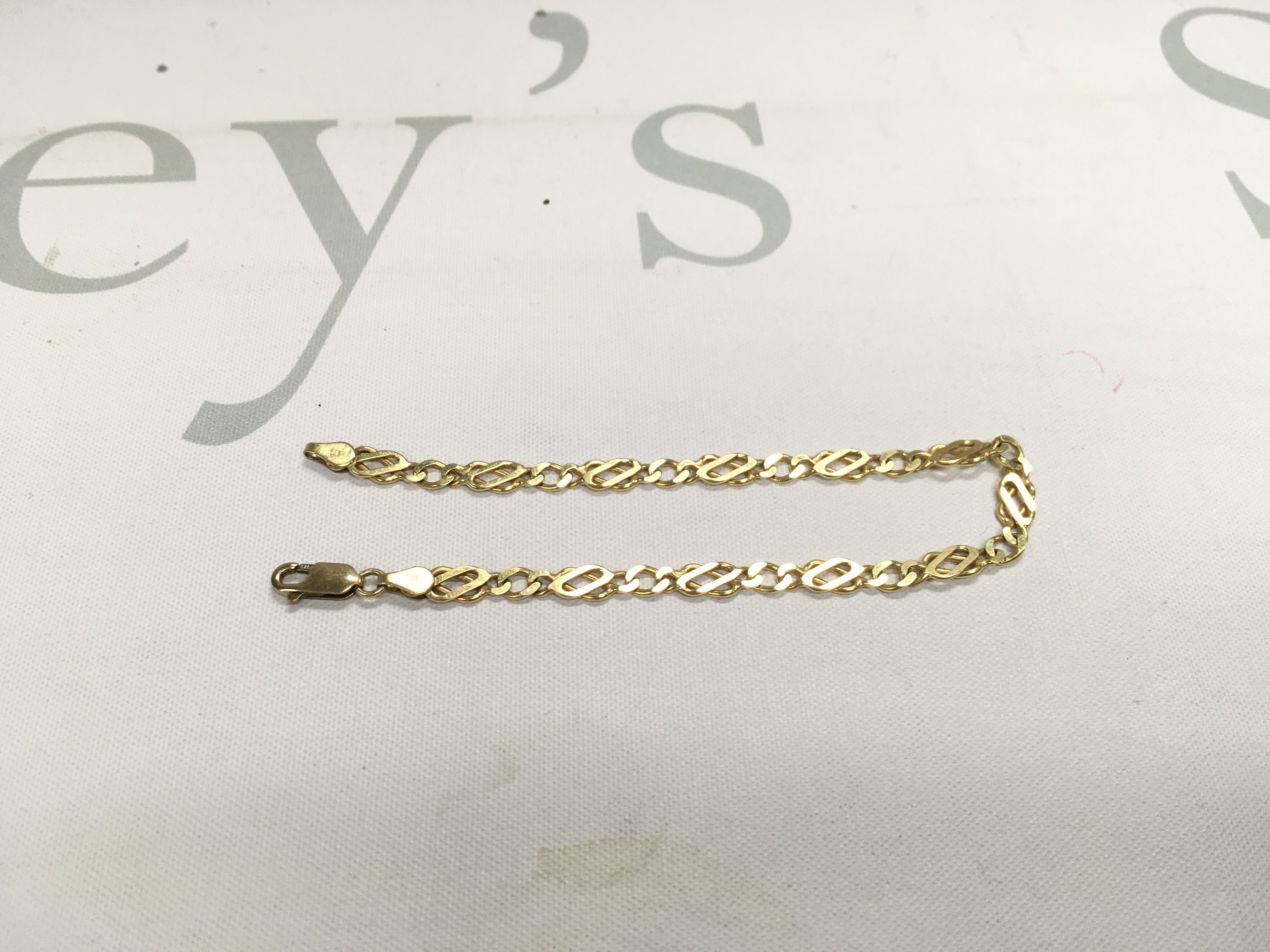 A 9ct gold fancy link bracelet, approx length 21cm, approx weight 6.2 grams.