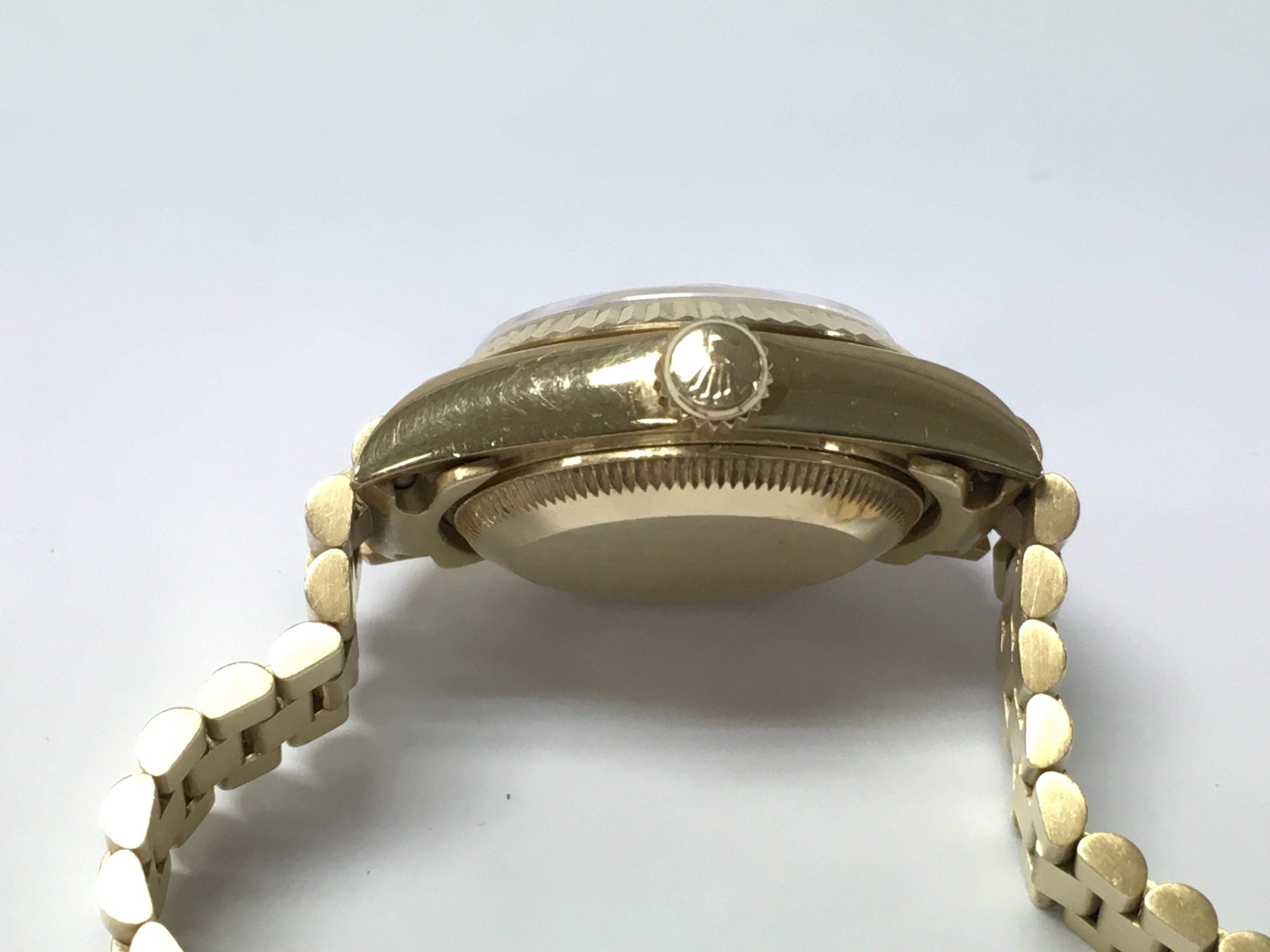 A rolex lady Datejust with diamond markers. 18k gold case and strap. 26mm. Watch winds and runs. Comes with box and paperwork including when vendor purchased from beaverbrooks in 2016. Watch is circa 1988.