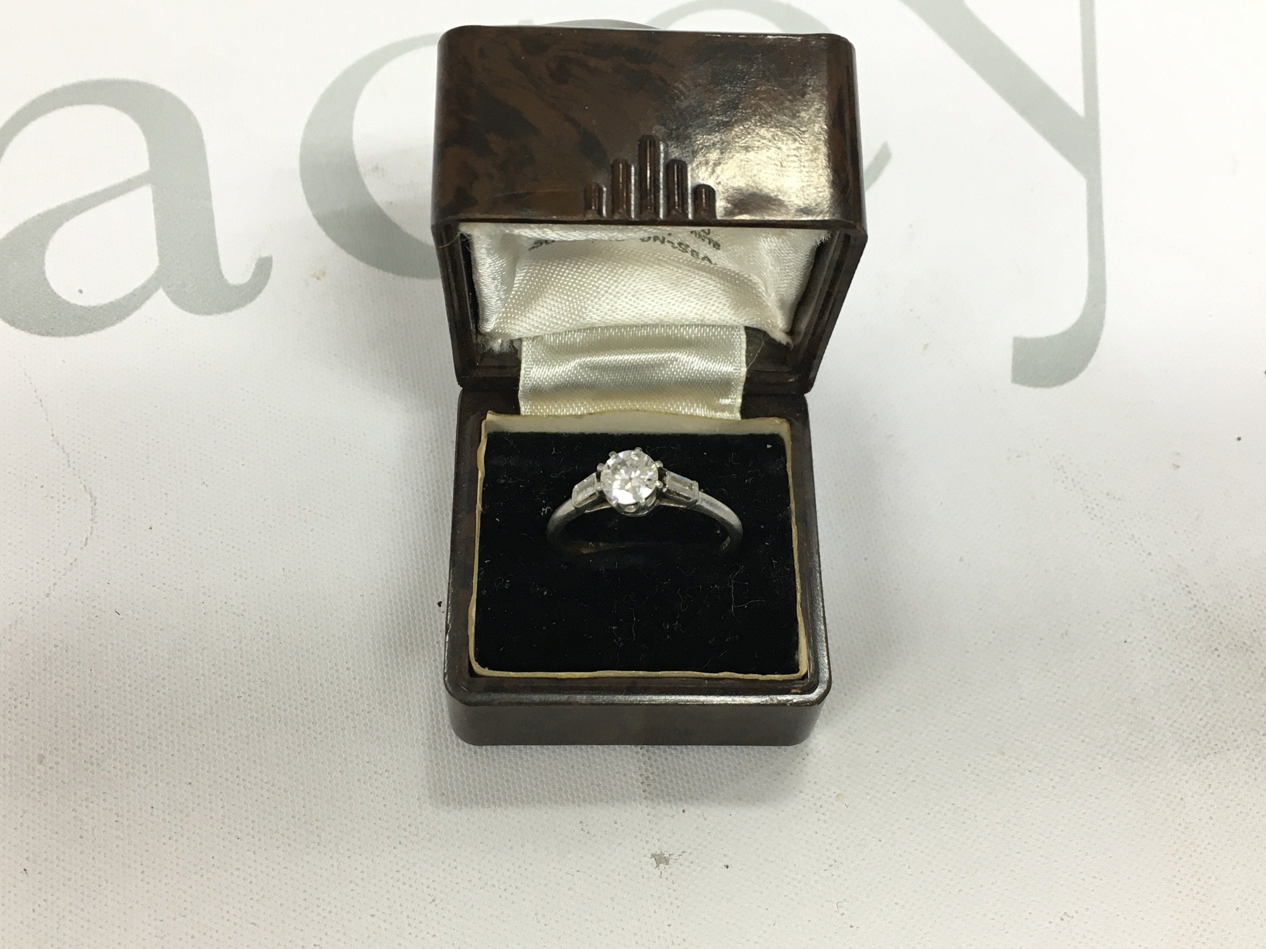 A platinum solitaire ring, approx 0.75cts, size L1/2. Approx weight 2.85 grams.