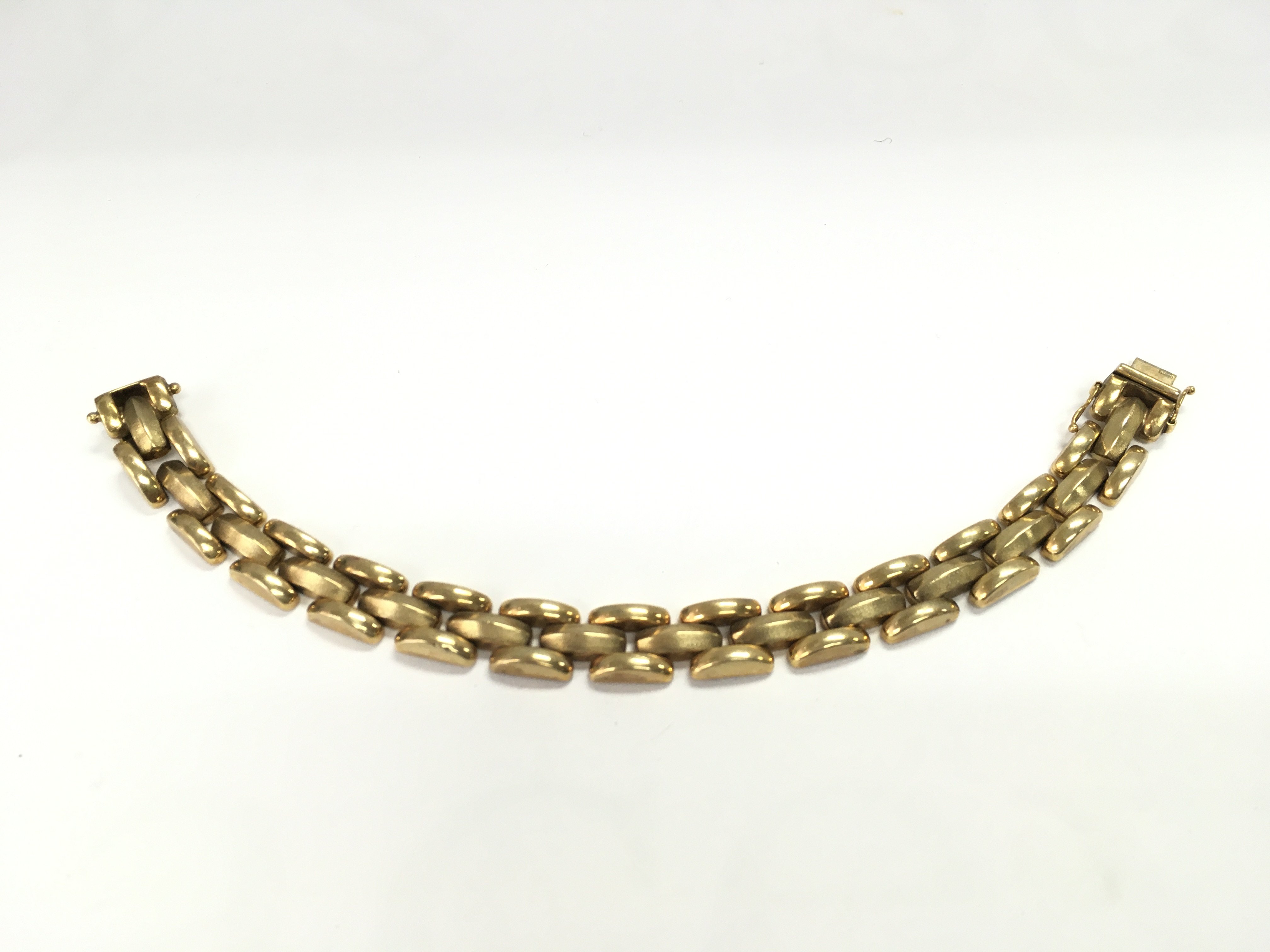 A 9ct gold bracelet. 25.41g and approximately 20cm long. Postage B