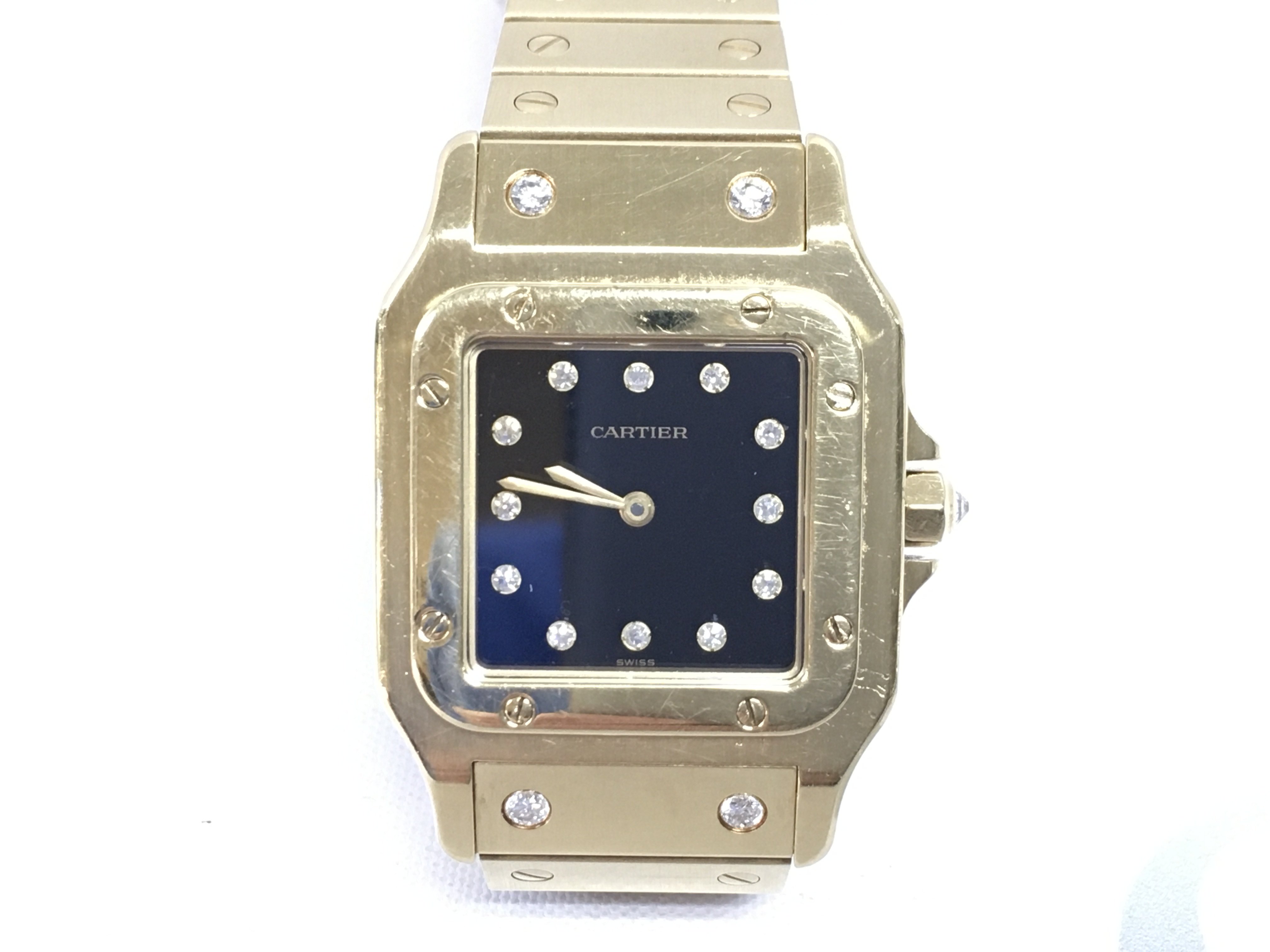 Cartier Santos Ladies Solid Gold With Diamond Factory Dial and on bracelet.