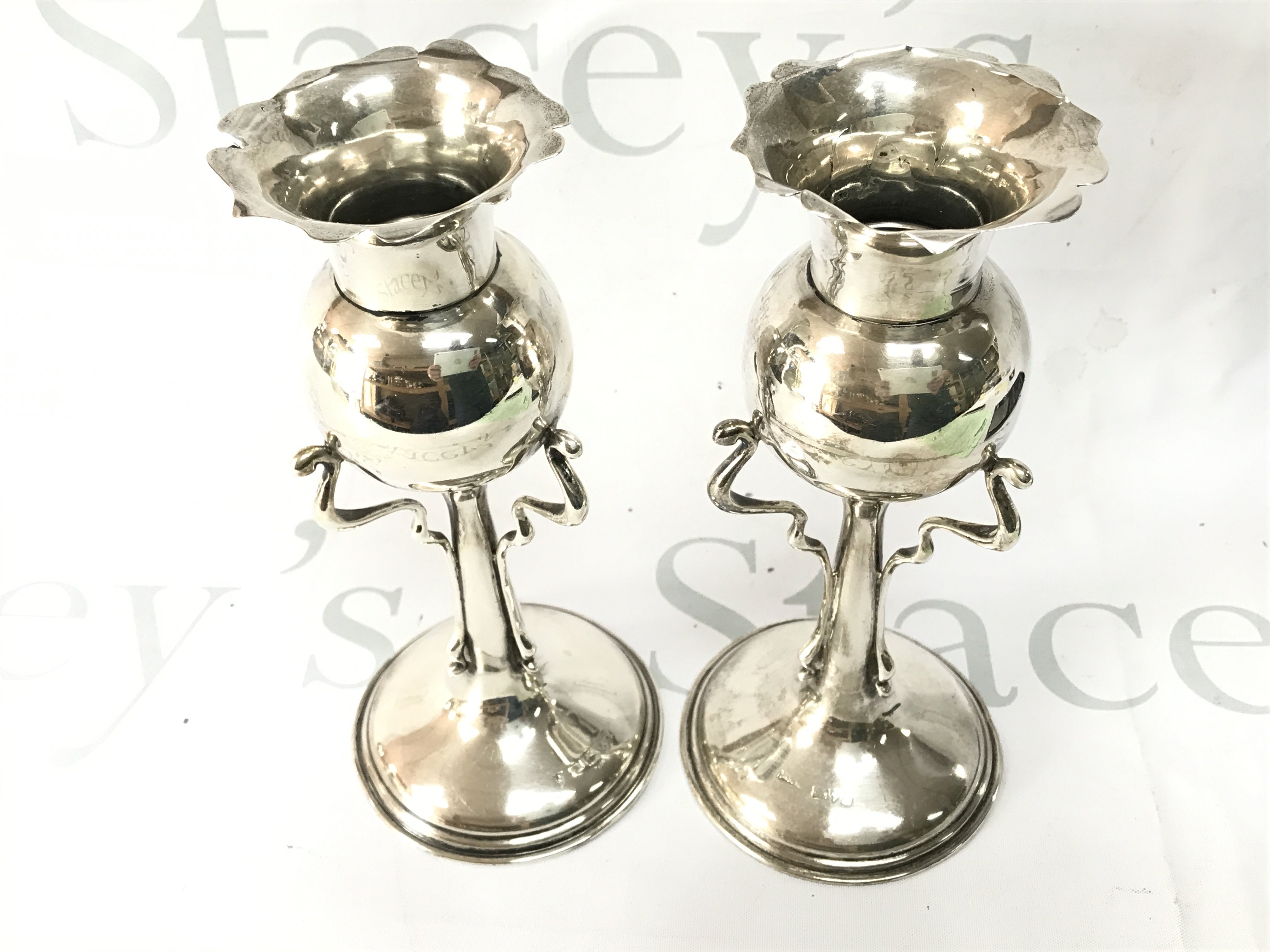 A pair of silver vases. 20cm tall and approx 292g