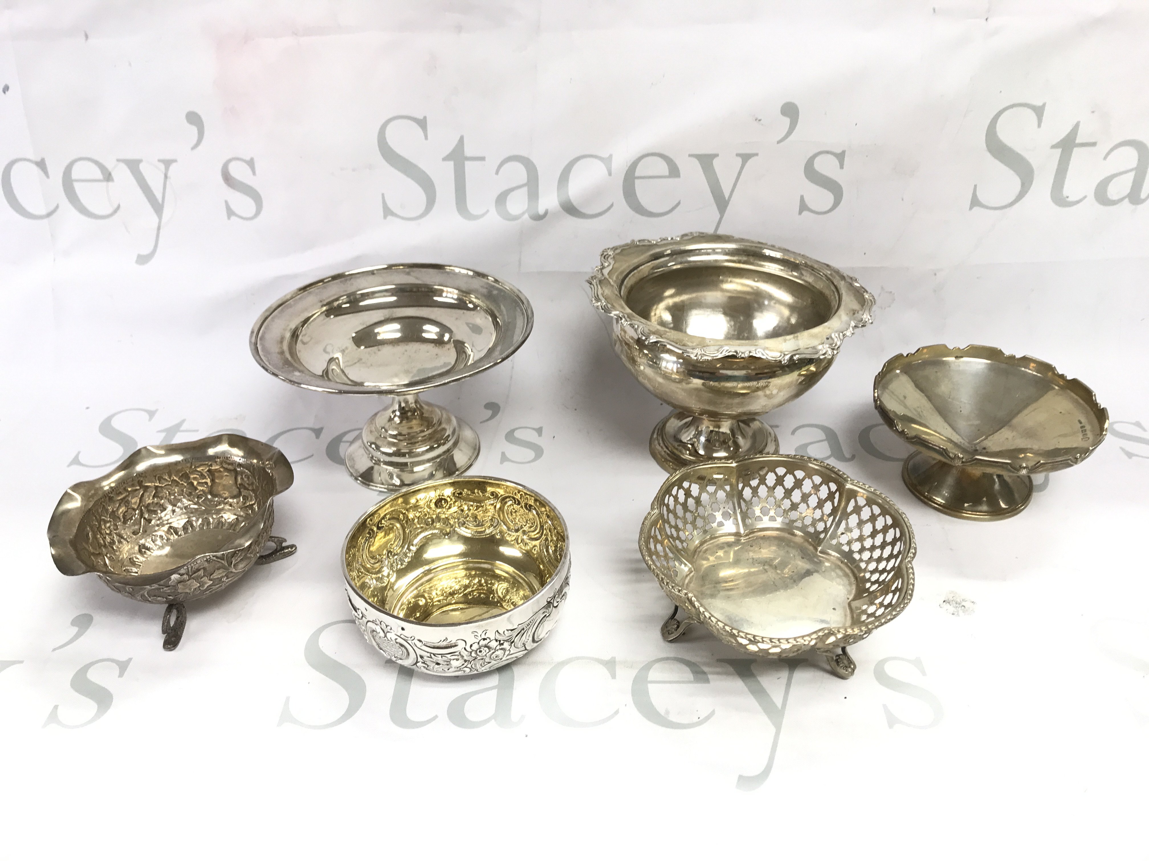 A collection of 6 silver bowls of various styles. 740g total. Postage C